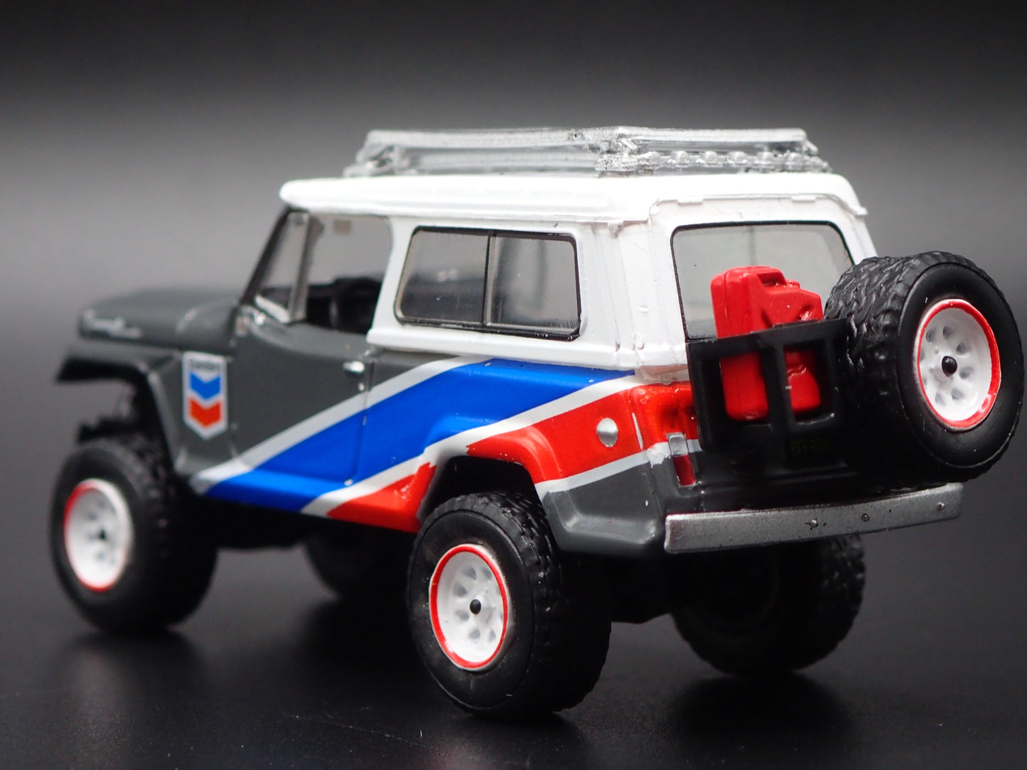 1966 - 1973 JEEP JEEPSTER COMMANDO CHEVRON GRAY 1:64 SCALE DIECAST MODEL CAR