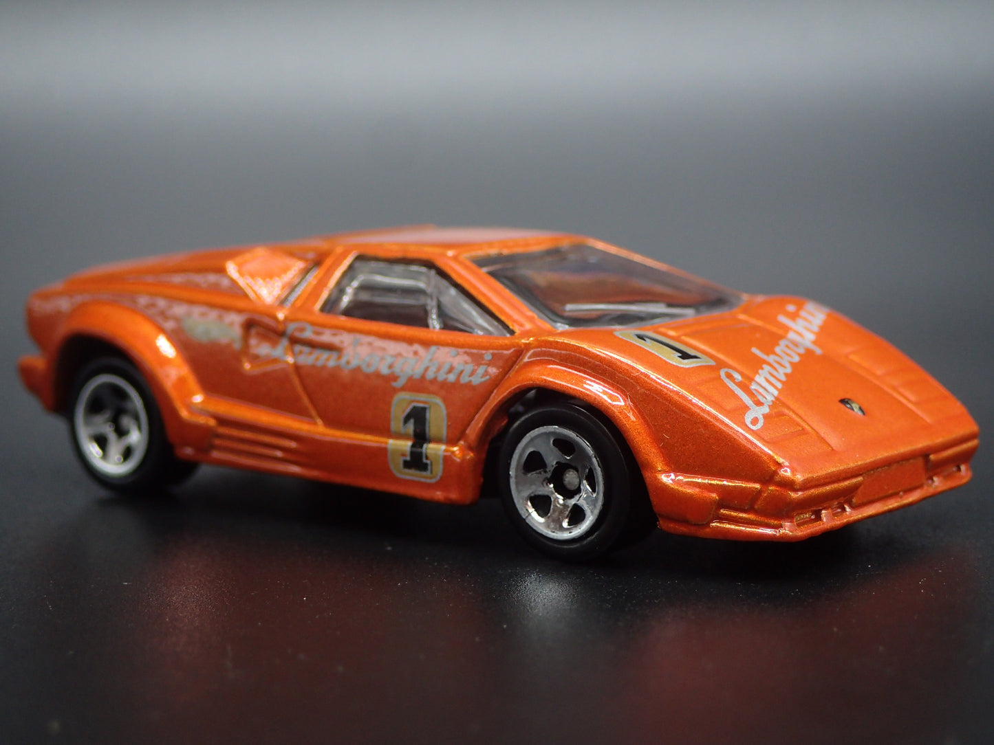 1974-1990 LAMBORGHINI COUNTACH 25TH ANNIVERSARY 1:64 SCALE DIECAST MODEL CAR