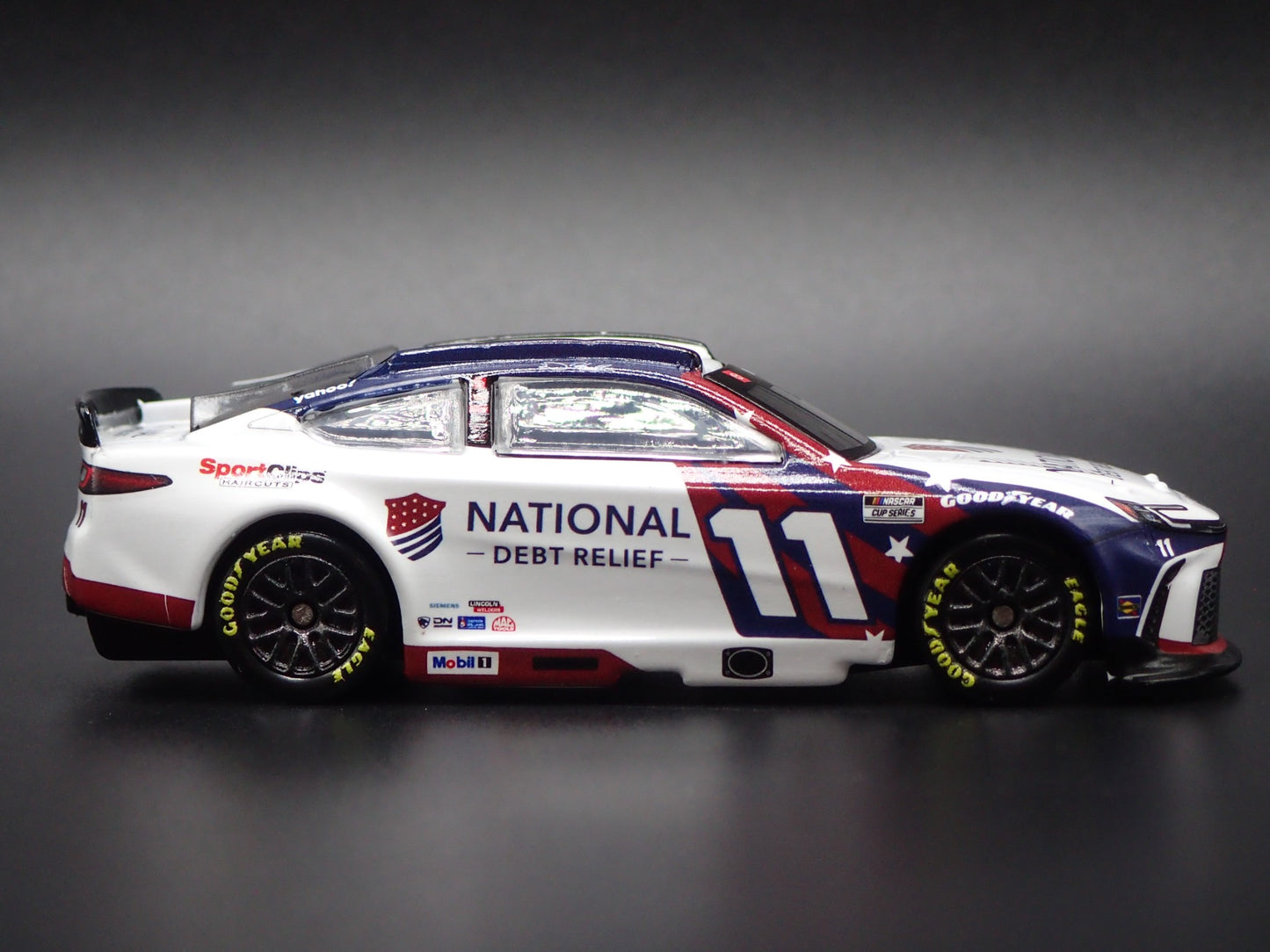 2025 25 TOYOTA CAMRY 11 DENNY HAMLIN DEBT RELIEF NASCAR 1:64 SCALE DIECAST CAR