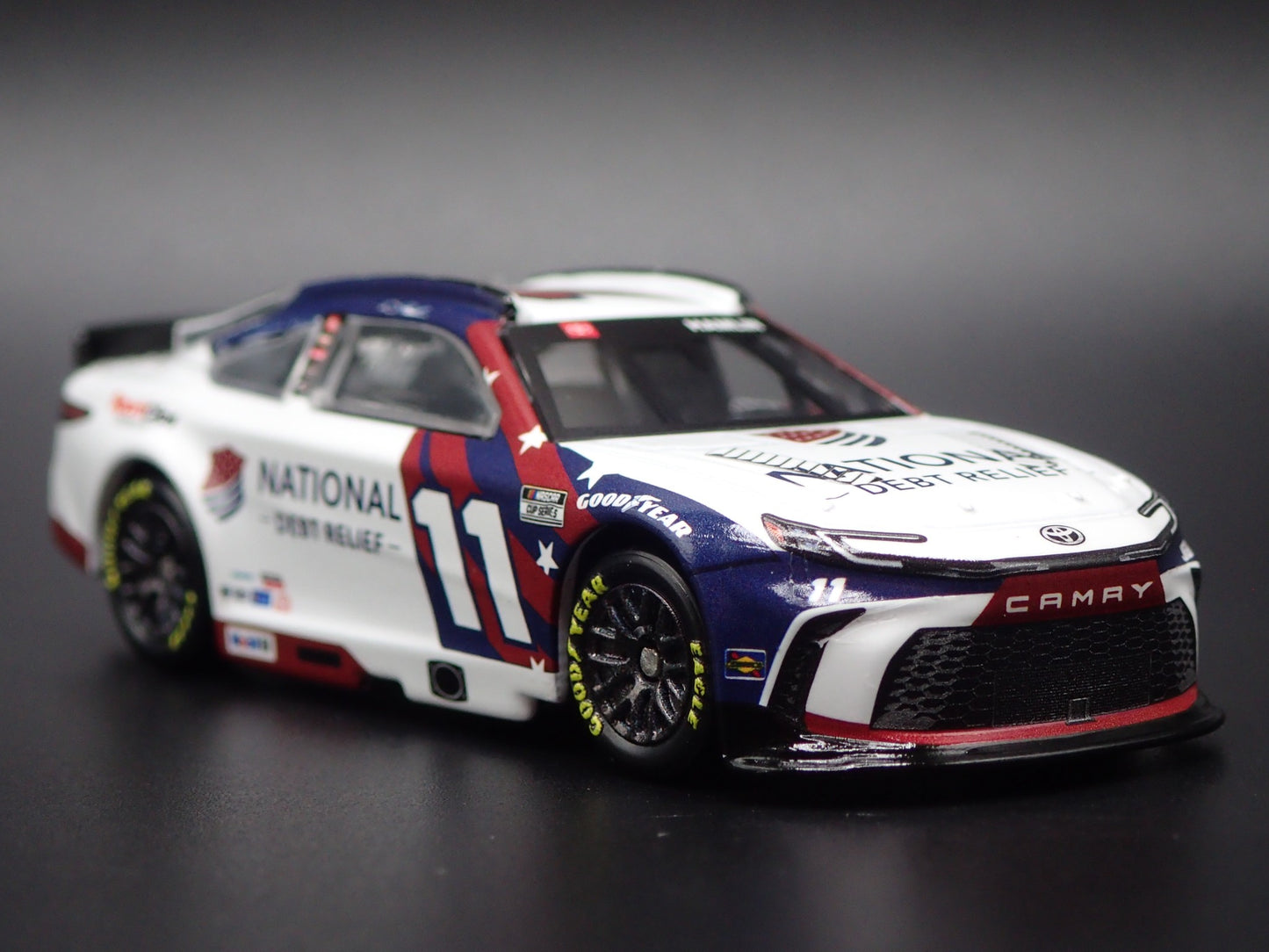 2025 25 TOYOTA CAMRY 11 DENNY HAMLIN DEBT RELIEF NASCAR 1:64 SCALE DIECAST CAR