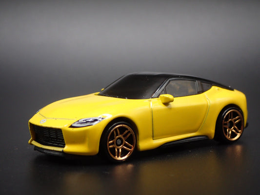 2023-2025 NISSAN Z YELLOW 1:64 SCALE COLLECTIBLE DIORAMA DIECAST MODEL CAR