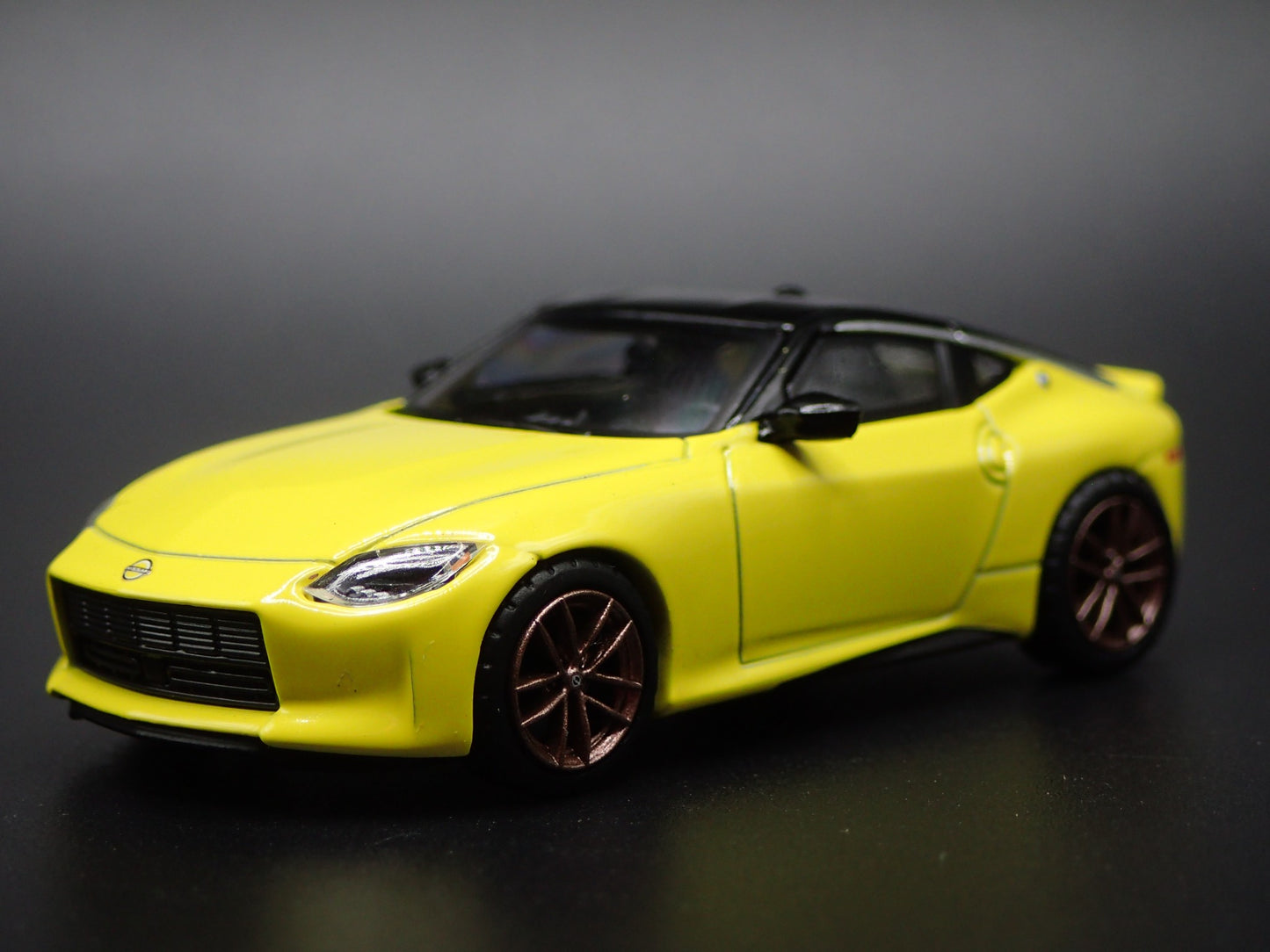 2023-2025 NISSAN Z YELLOW 1:64 SCALE COLLECTIBLE DIORAMA DIECAST MODEL CAR