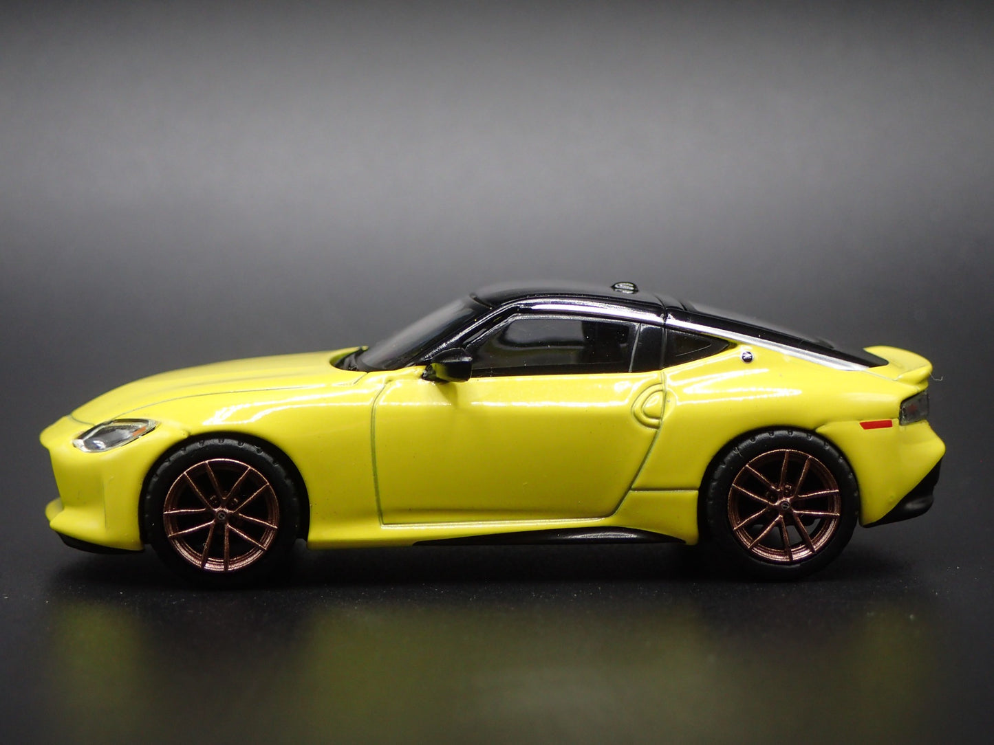2023-2025 NISSAN Z YELLOW 1:64 SCALE COLLECTIBLE DIORAMA DIECAST MODEL CAR