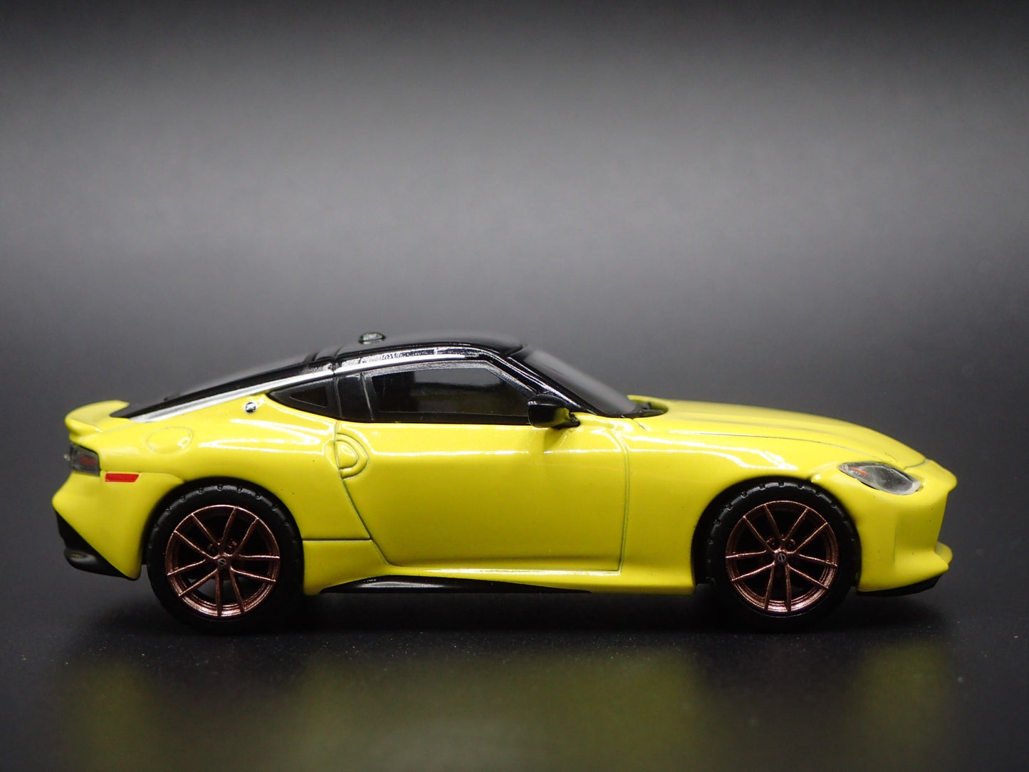 2023-2025 NISSAN Z YELLOW 1:64 SCALE COLLECTIBLE DIORAMA DIECAST MODEL CAR