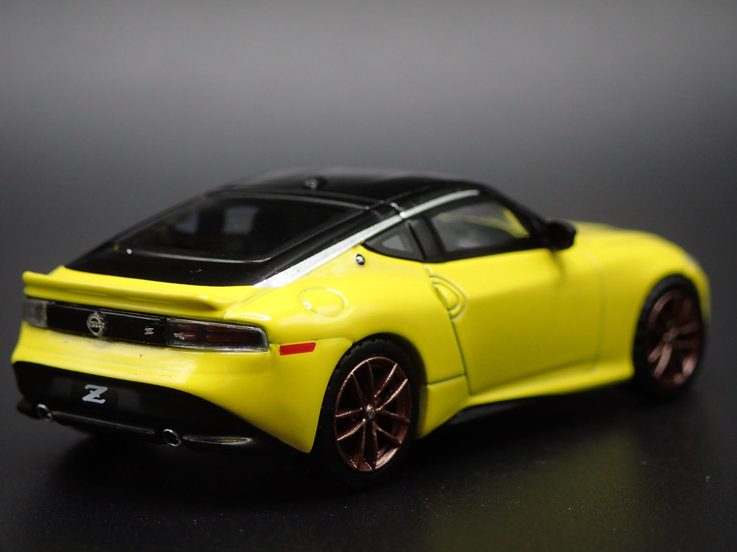 2023-2025 NISSAN Z YELLOW 1:64 SCALE COLLECTIBLE DIORAMA DIECAST MODEL CAR