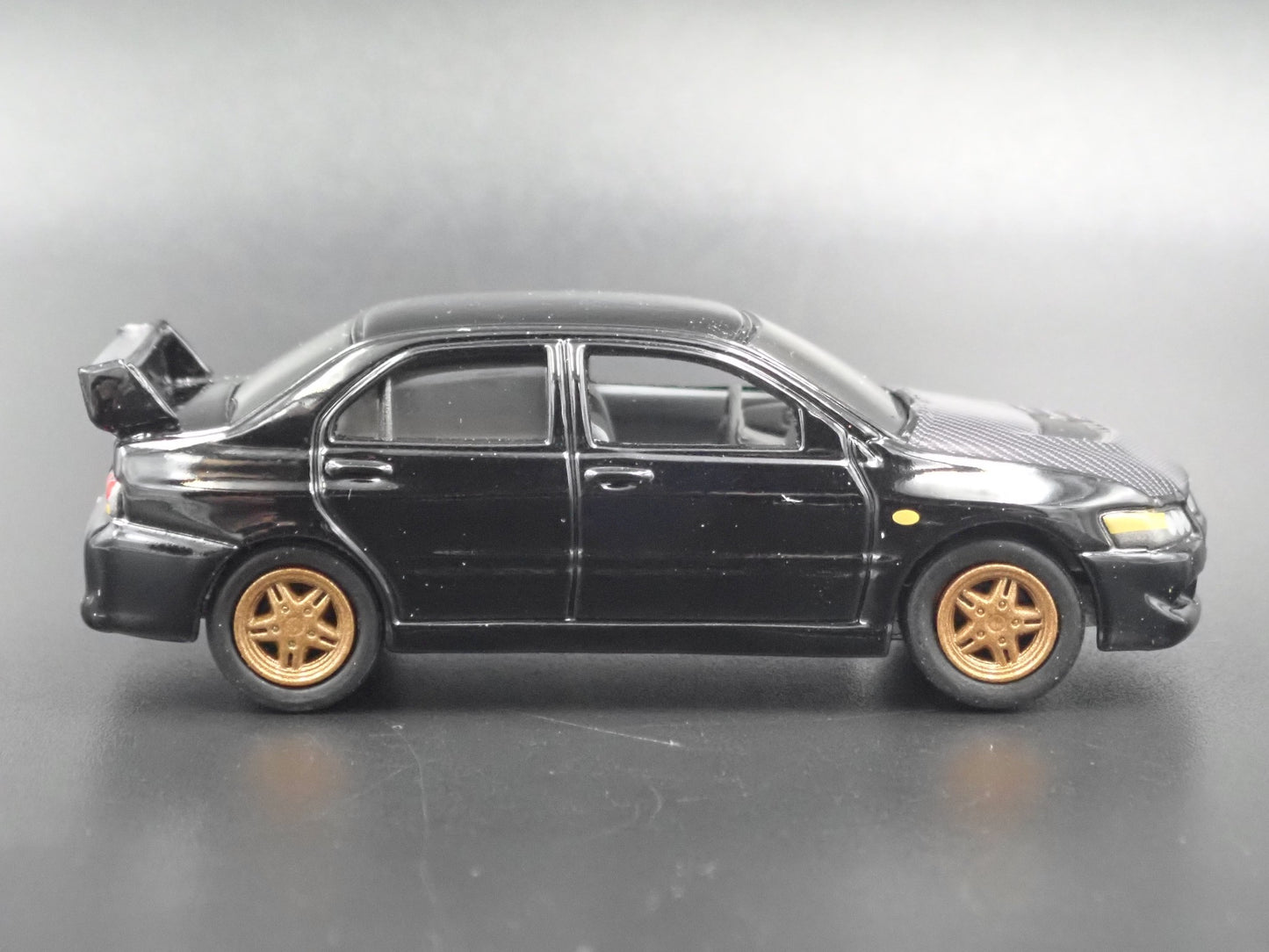 1999-2007 MITSUBISHI LANCER EVOLUTION EVO IV BLACK 1:64 SCALE DIECAST MODEL CAR