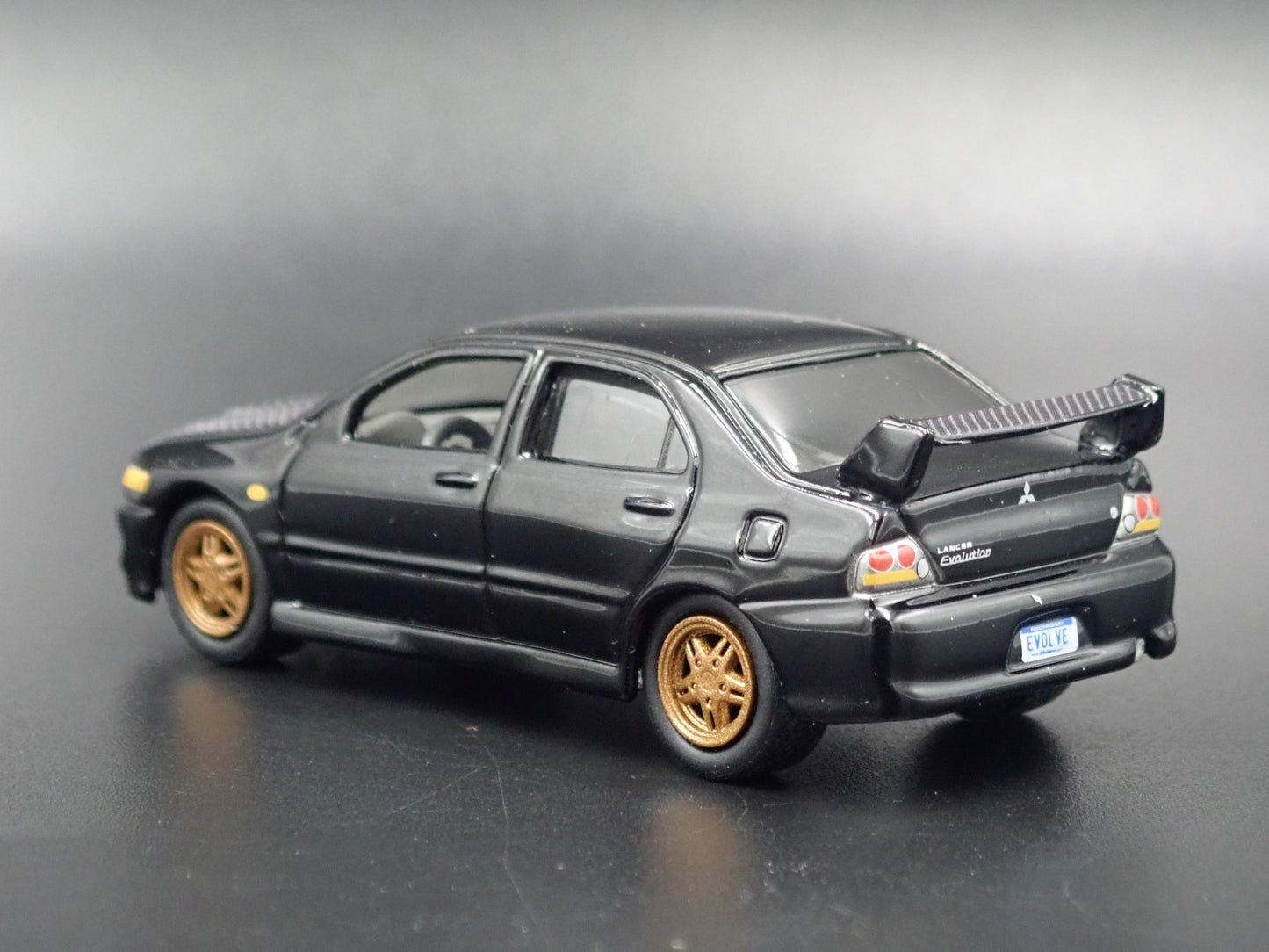 1999-2007 MITSUBISHI LANCER EVOLUTION EVO IV BLACK 1:64 SCALE DIECAST MODEL CAR