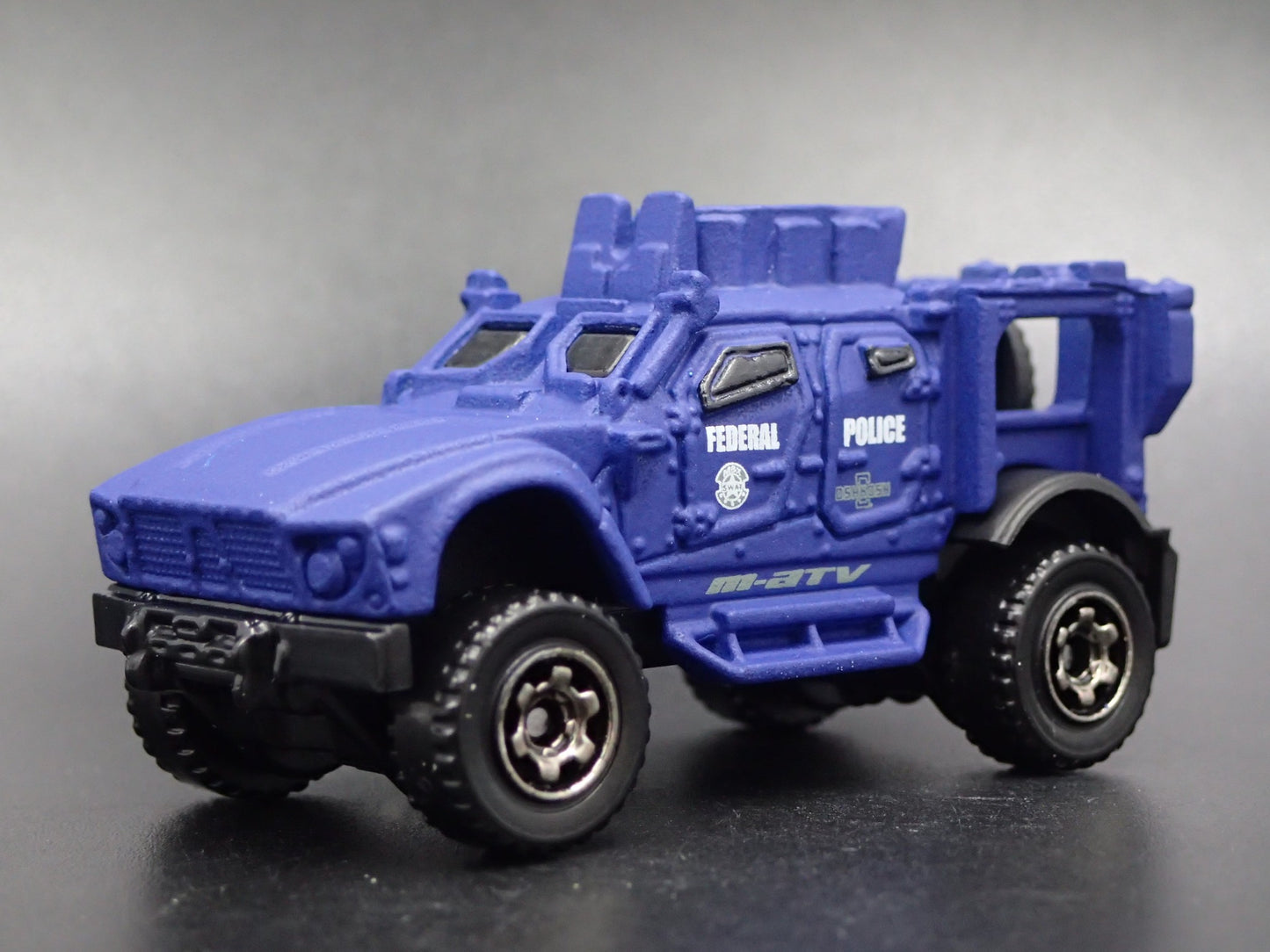 OSHKOSH DEFENSE M-ATV FEDERAL POLICE 1:64 MB SCALE DIORAMA DIECAST MODEL CAR