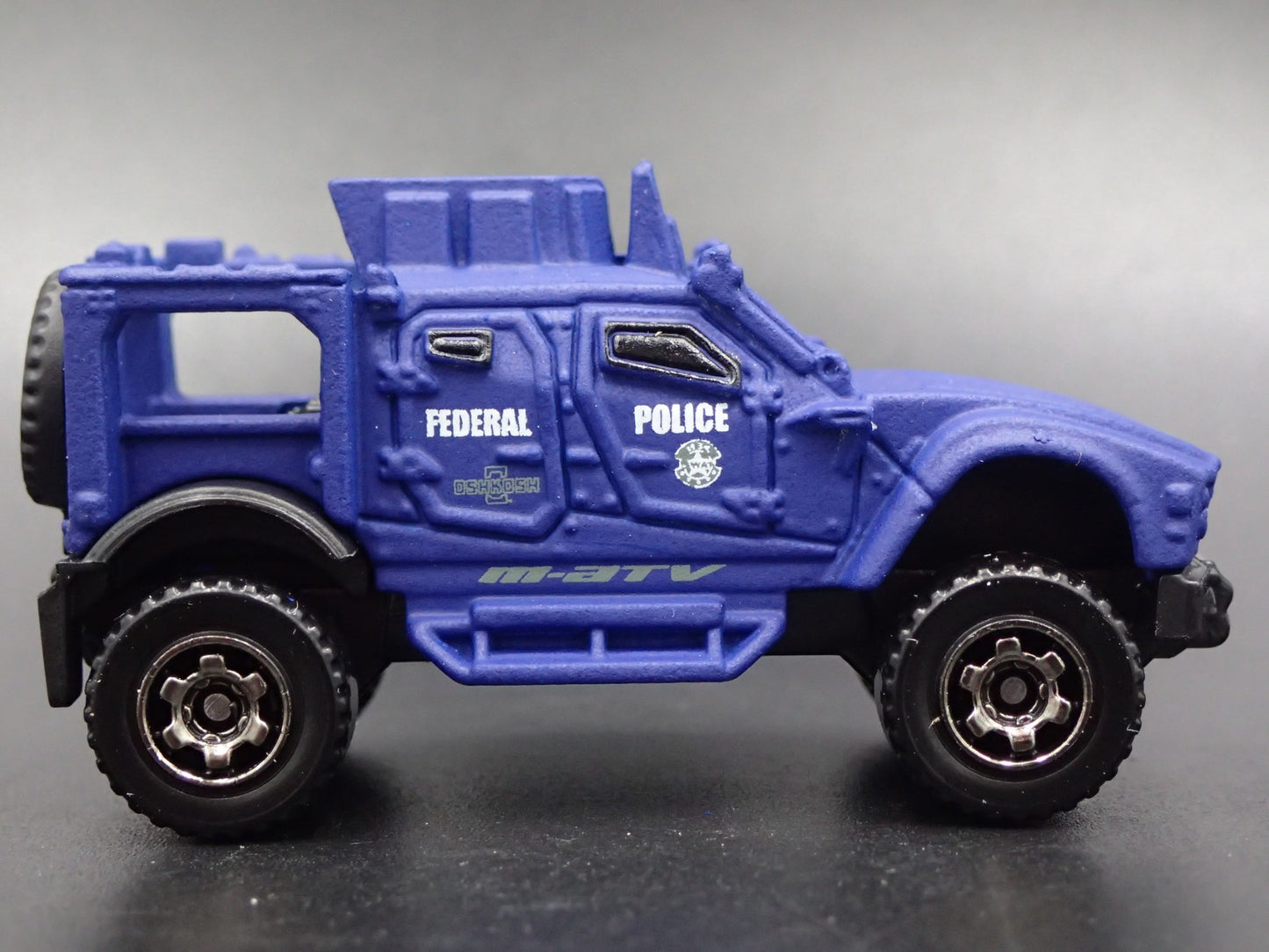 OSHKOSH DEFENSE M-ATV FEDERAL POLICE 1:64 MB SCALE DIORAMA DIECAST MODEL CAR
