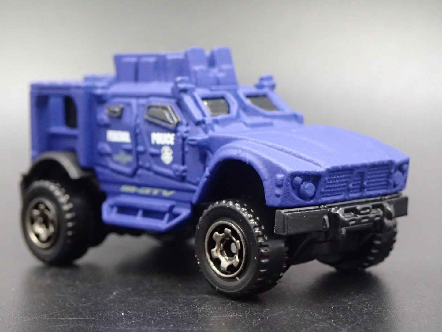 OSHKOSH DEFENSE M-ATV FEDERAL POLICE 1:64 MB SCALE DIORAMA DIECAST MODEL CAR