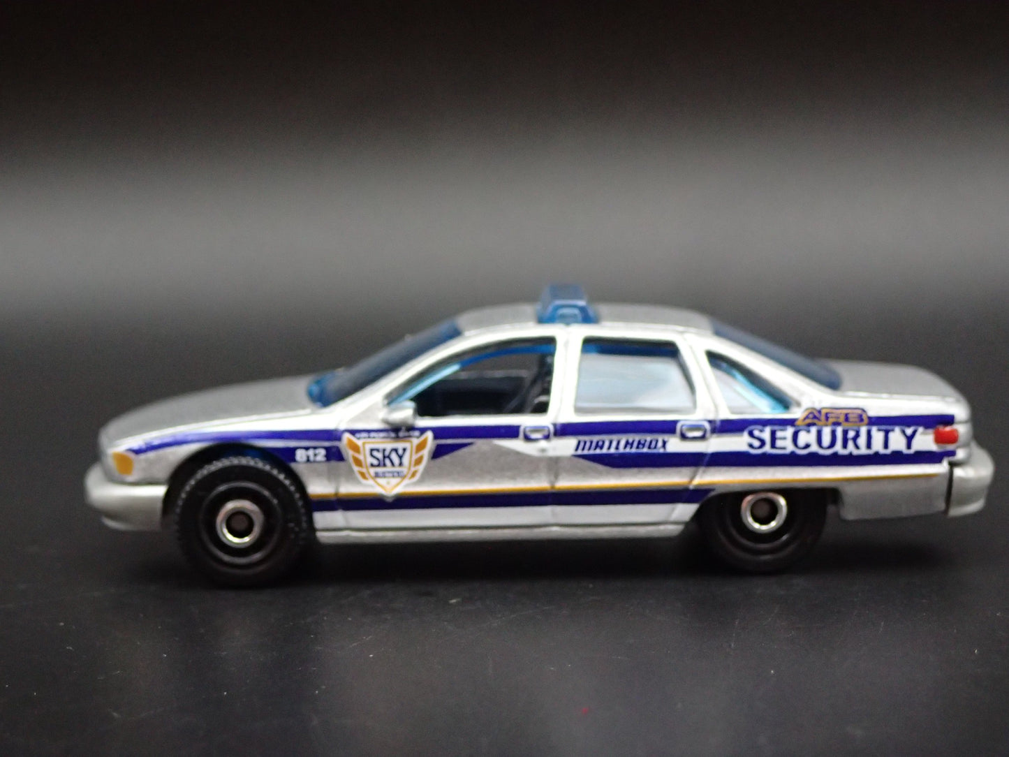 1991-1996 CHEVY CHEVROLET CAPRICE POLICE SECURITY 1/64 SCALE DIECAST MODEL CAR