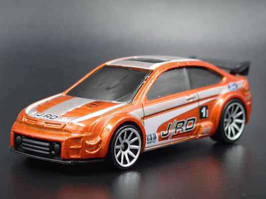 2004-2011 FORD FOCUS RED RARE 1:64 SCALE COLLECTIBLE DIORAMA DIECAST MODEL CAR