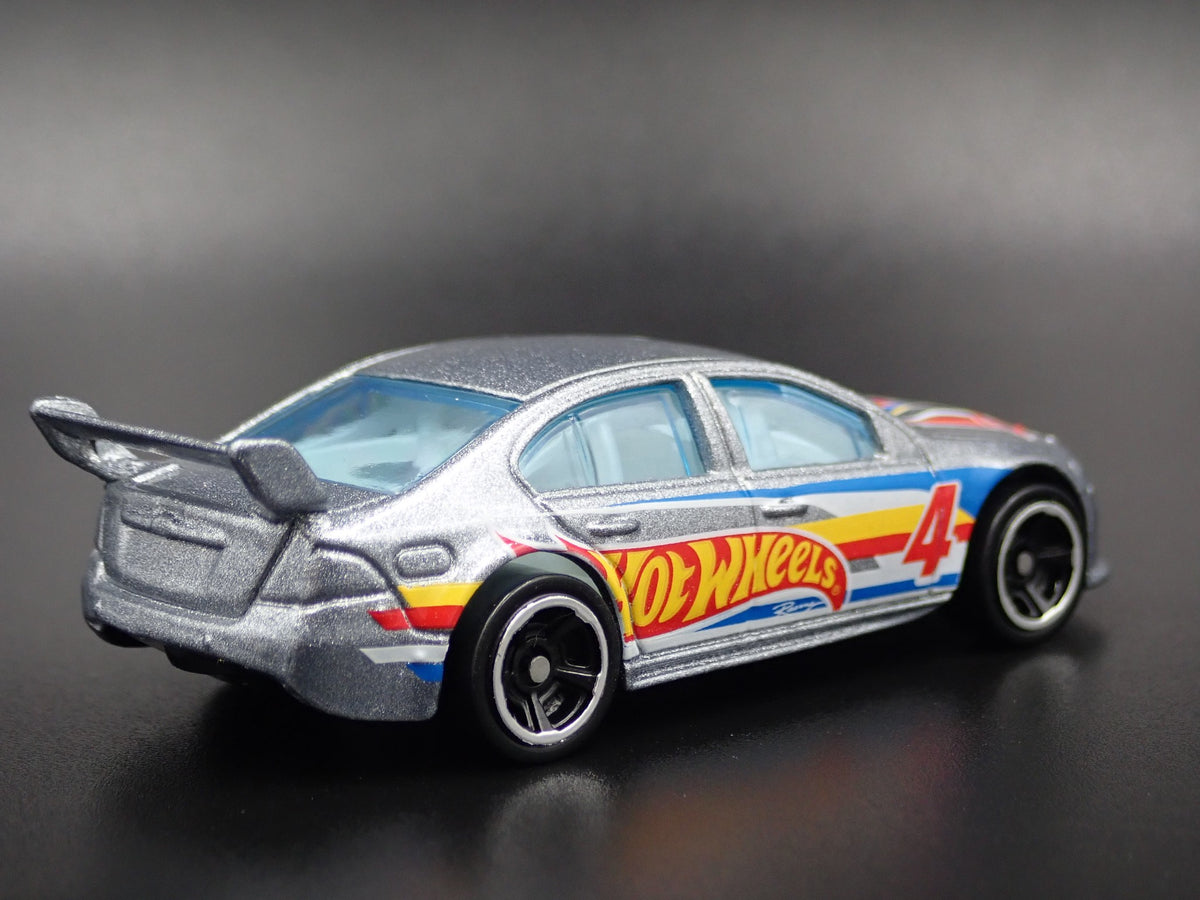 FORD FALCON RACE CAR HOT WHEELS 1:64 SCALE COLLECTIBLE DIORAMA DIECAST MODEL CAR-Burning Rubber Toy Company