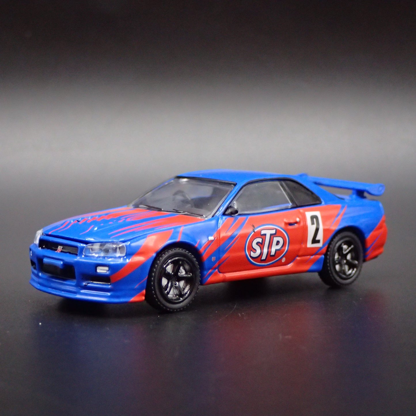 1999-2002 NISSAN SKYLINE GTR R34 STP 1:64 SCALE COLLECTIBLE DIECAST MODEL CAR