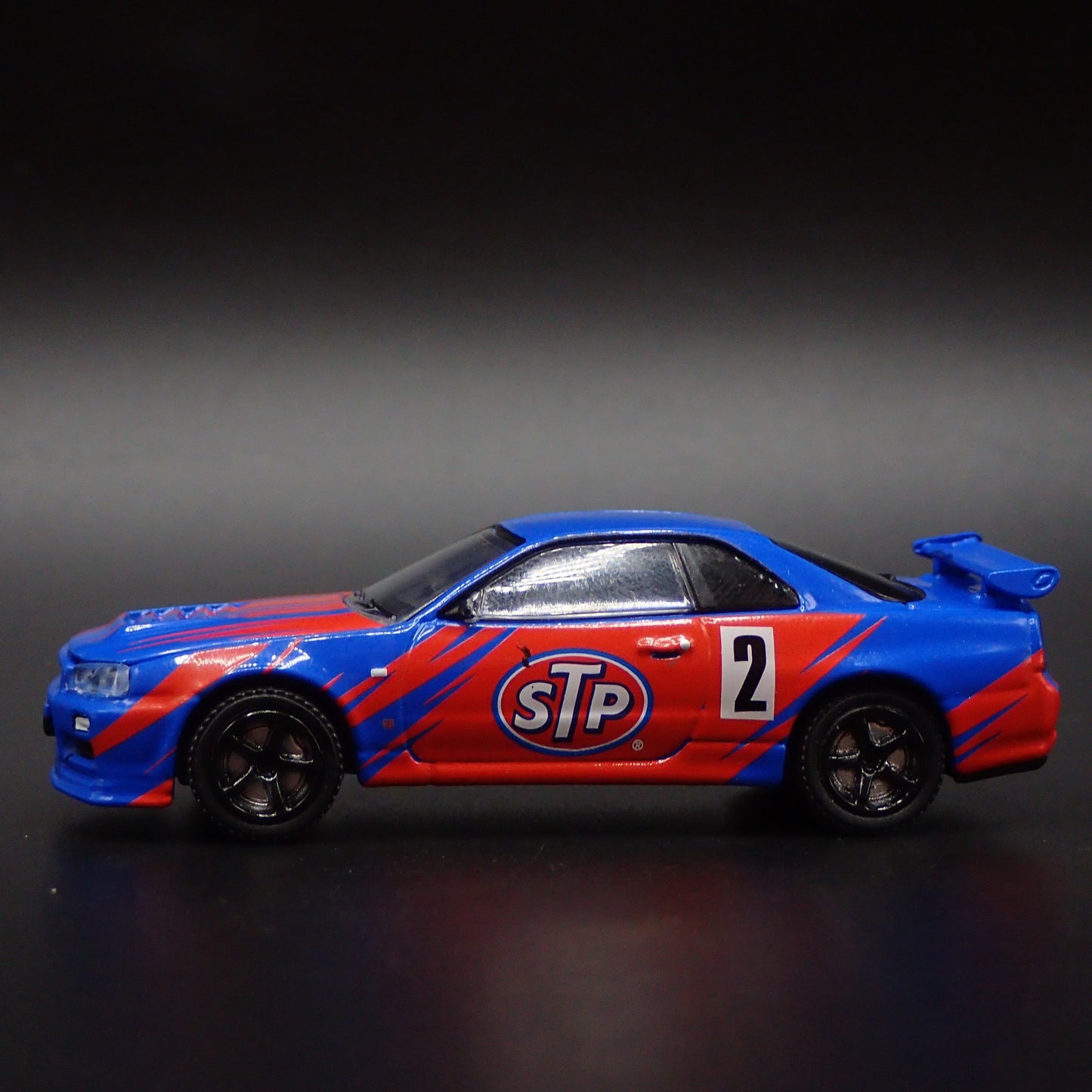 1999-2002 NISSAN SKYLINE GTR R34 STP 1:64 SCALE COLLECTIBLE DIECAST MODEL CAR