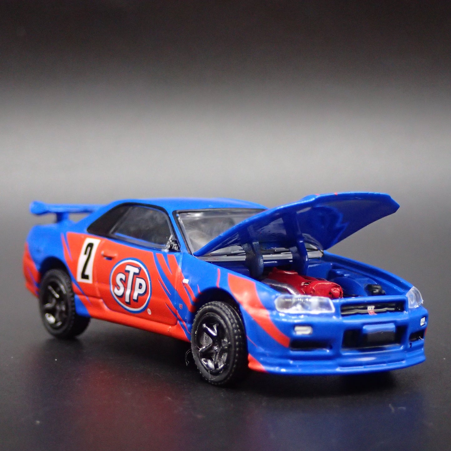 1999-2002 NISSAN SKYLINE GTR R34 STP 1:64 SCALE COLLECTIBLE DIECAST MODEL CAR