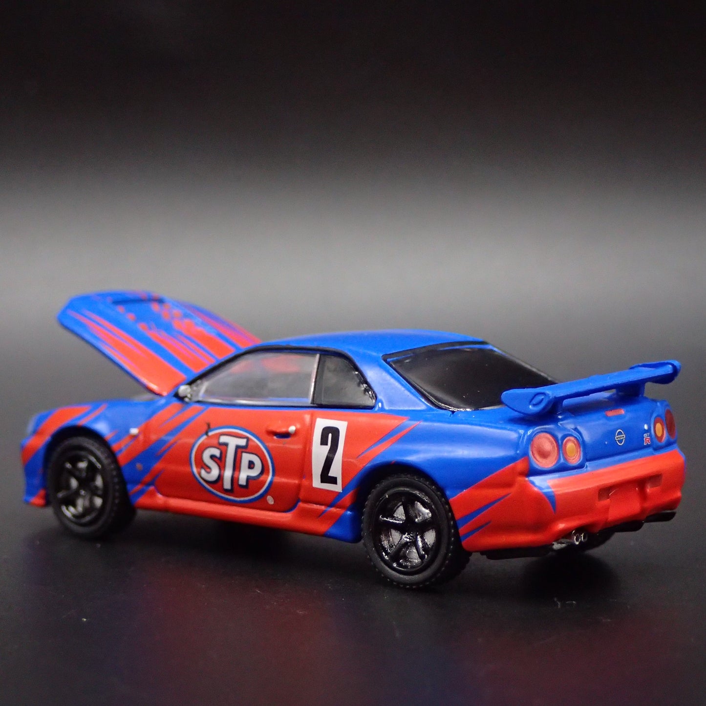 1999-2002 NISSAN SKYLINE GTR R34 STP 1:64 SCALE COLLECTIBLE DIECAST MODEL CAR