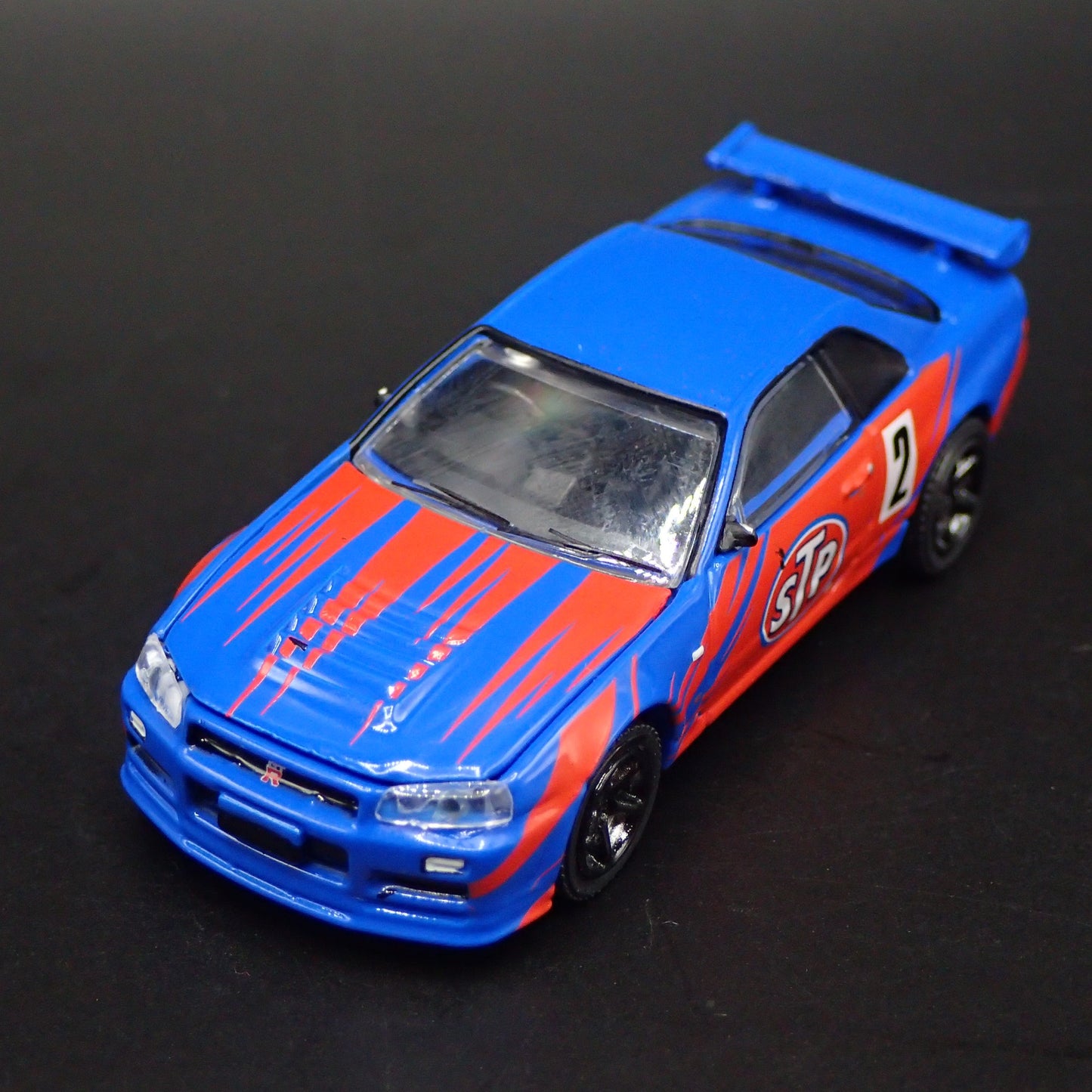 1999-2002 NISSAN SKYLINE GTR R34 STP 1:64 SCALE COLLECTIBLE DIECAST MODEL CAR