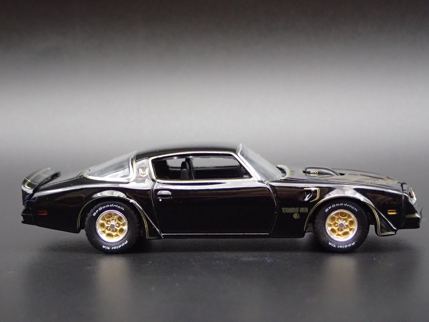 1976 76 PONTIAC FIREBIRD T/A 50TH ANNIVERSARY BLACK 1:64 SCALE DIECAST MODEL CAR