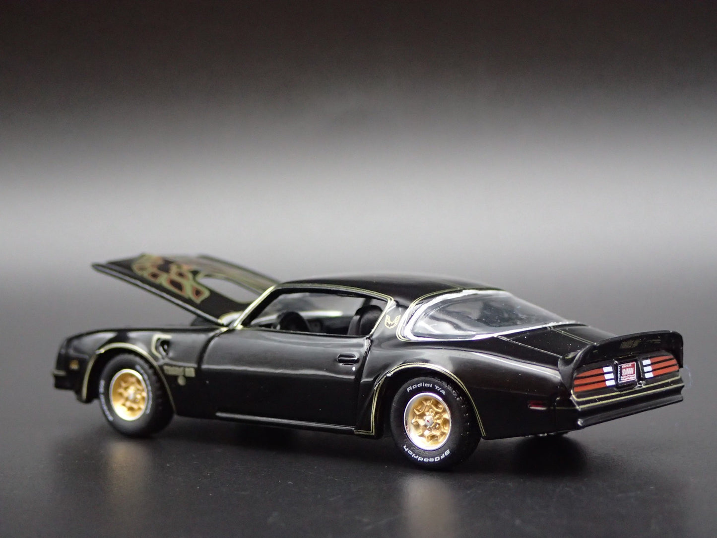 1976 76 PONTIAC FIREBIRD T/A 50TH ANNIVERSARY BLACK 1:64 SCALE DIECAST MODEL CAR