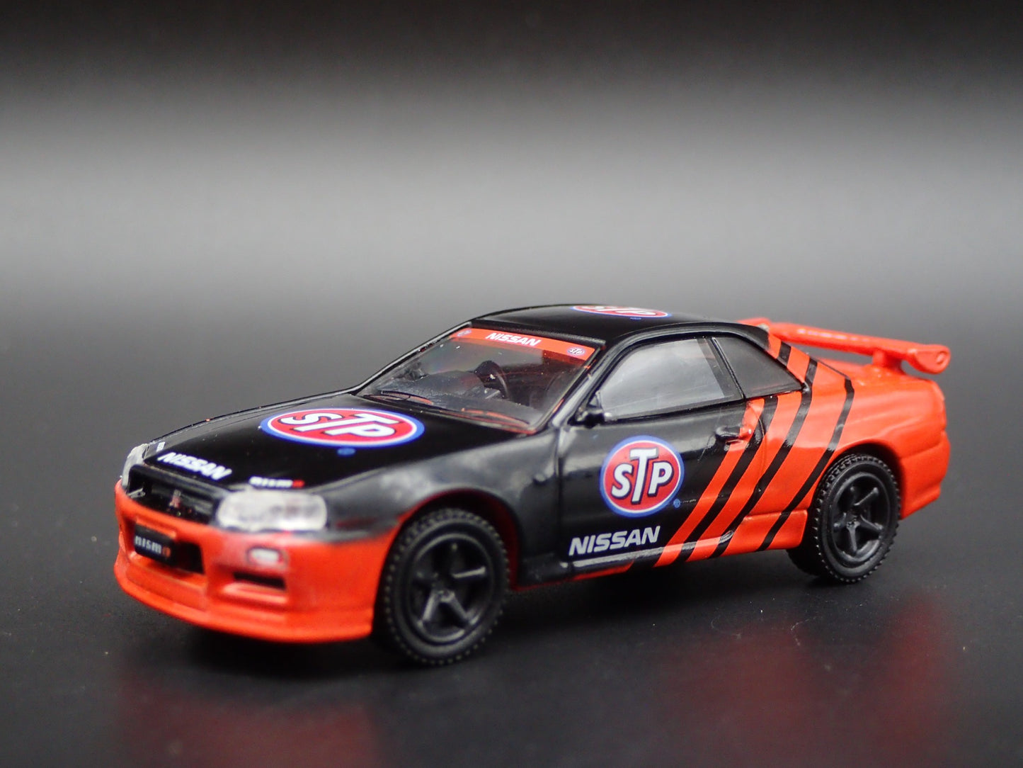 1999-2002 NISSAN SKYLINE GTR R34 STP 1:64 SCALE COLLECTIBLE DIECAST MODEL CAR
