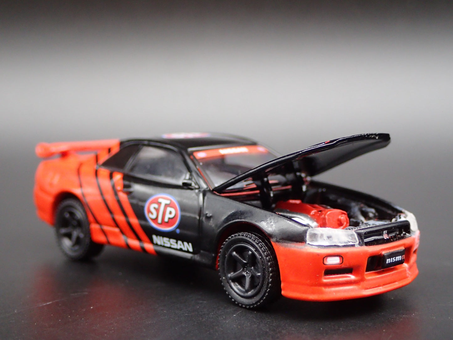 1999-2002 NISSAN SKYLINE GTR R34 STP 1:64 SCALE COLLECTIBLE DIECAST MODEL CAR