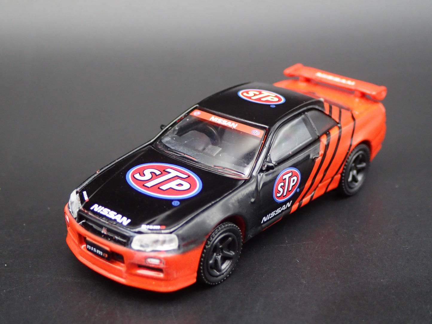 1999-2002 NISSAN SKYLINE GTR R34 STP 1:64 SCALE COLLECTIBLE DIECAST MODEL CAR