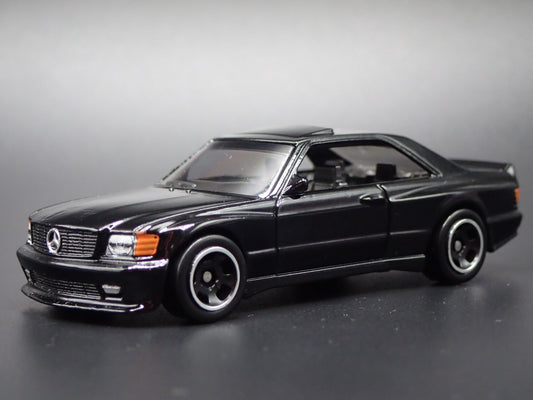 1985-1991 MERCEDES-BENZ 560 SEC AMG BLACK 1:64 SCALE DIORAMA DIECAST MODEL CAR