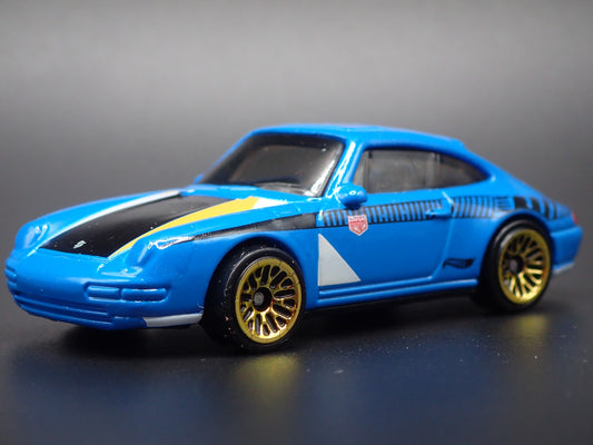 1994-1998 PORSCHE 911 CARRERA 993 BLUE 1:64 SCALE DIORAMA DIECAST MODEL CAR