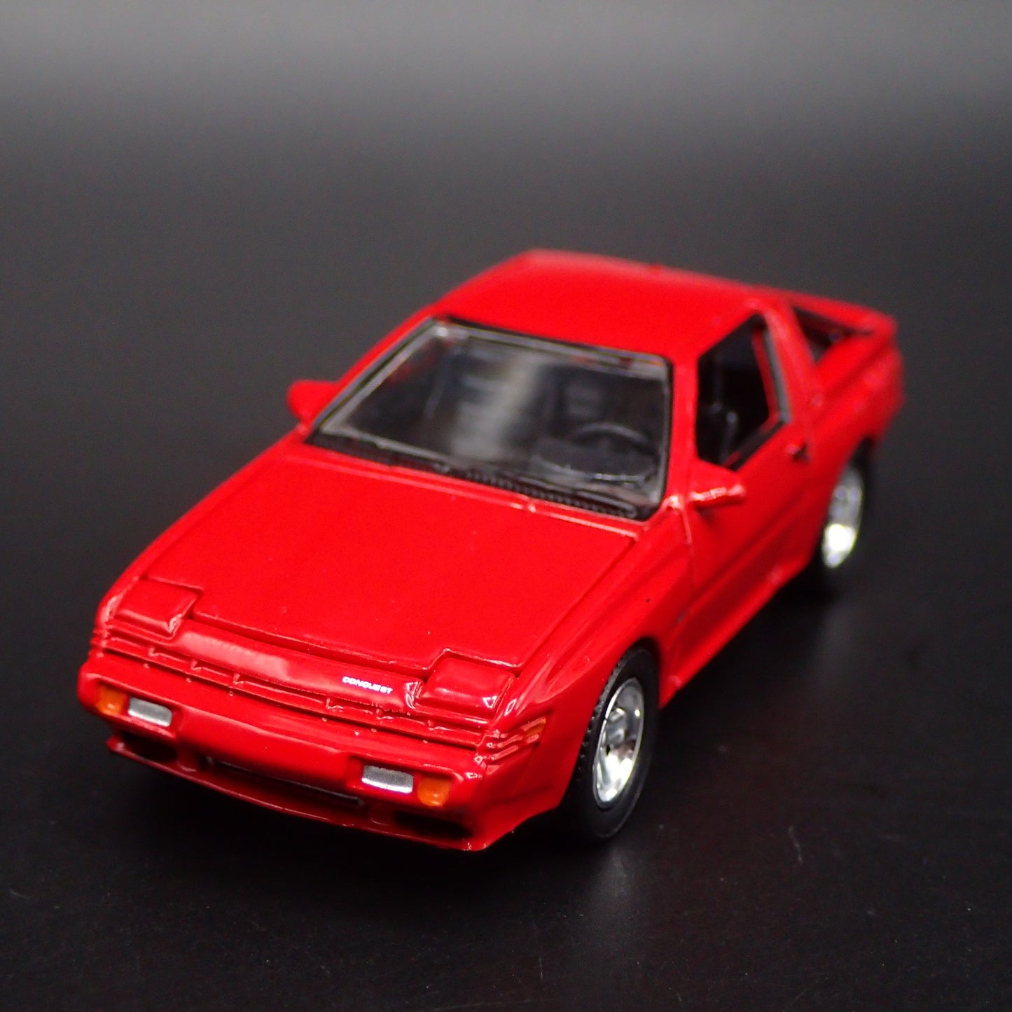 1986 86 DODGE CONQUEST TSI RED 1:64 SCALE COLLECTIBLE DIORAMA DIECAST MODEL CAR