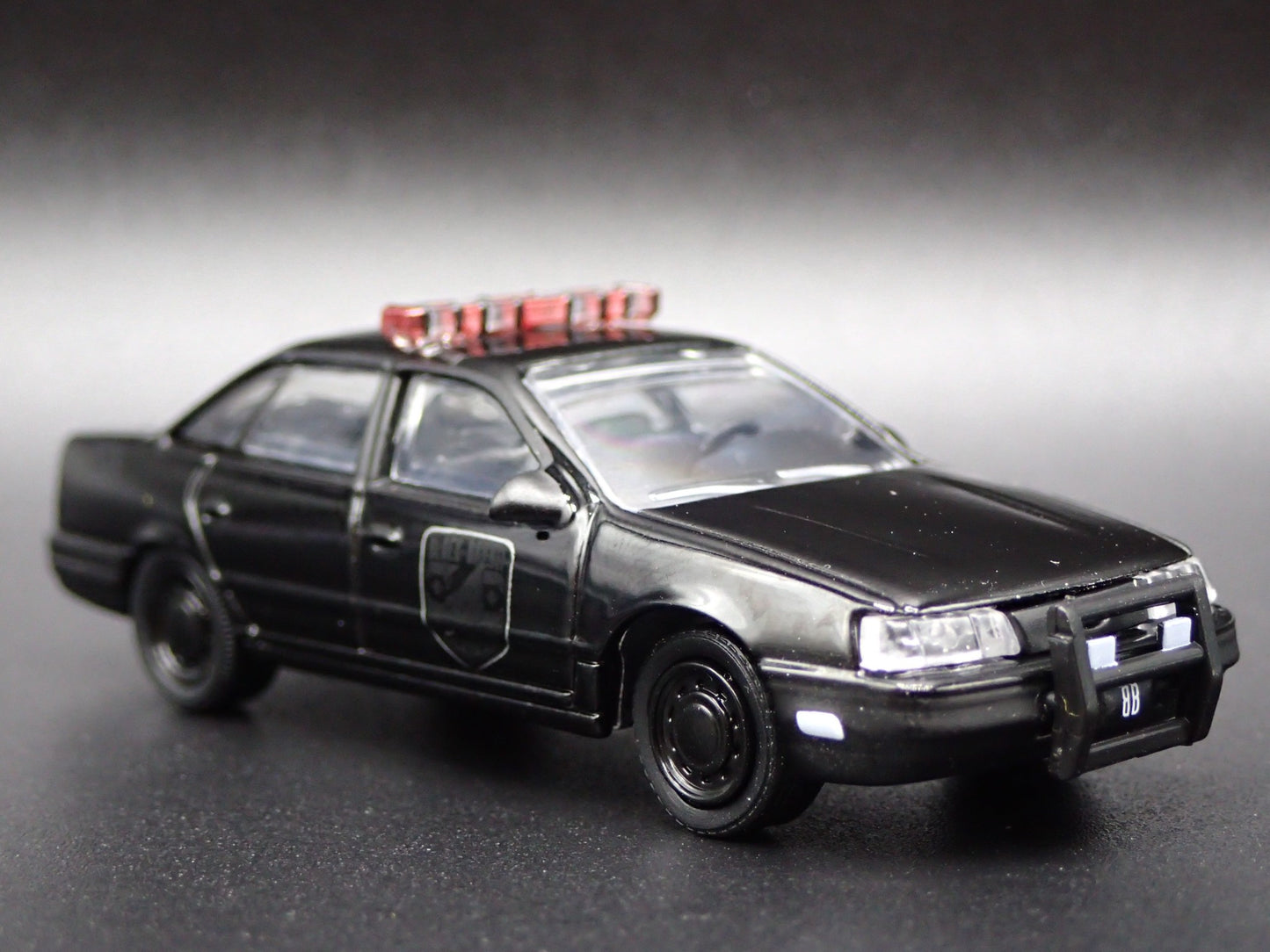 1986-1991 FORD TAURUS POLICE CAR 4 FOUR DOOR BLACK 1:64 SCALE DIECAST MODEL CAR