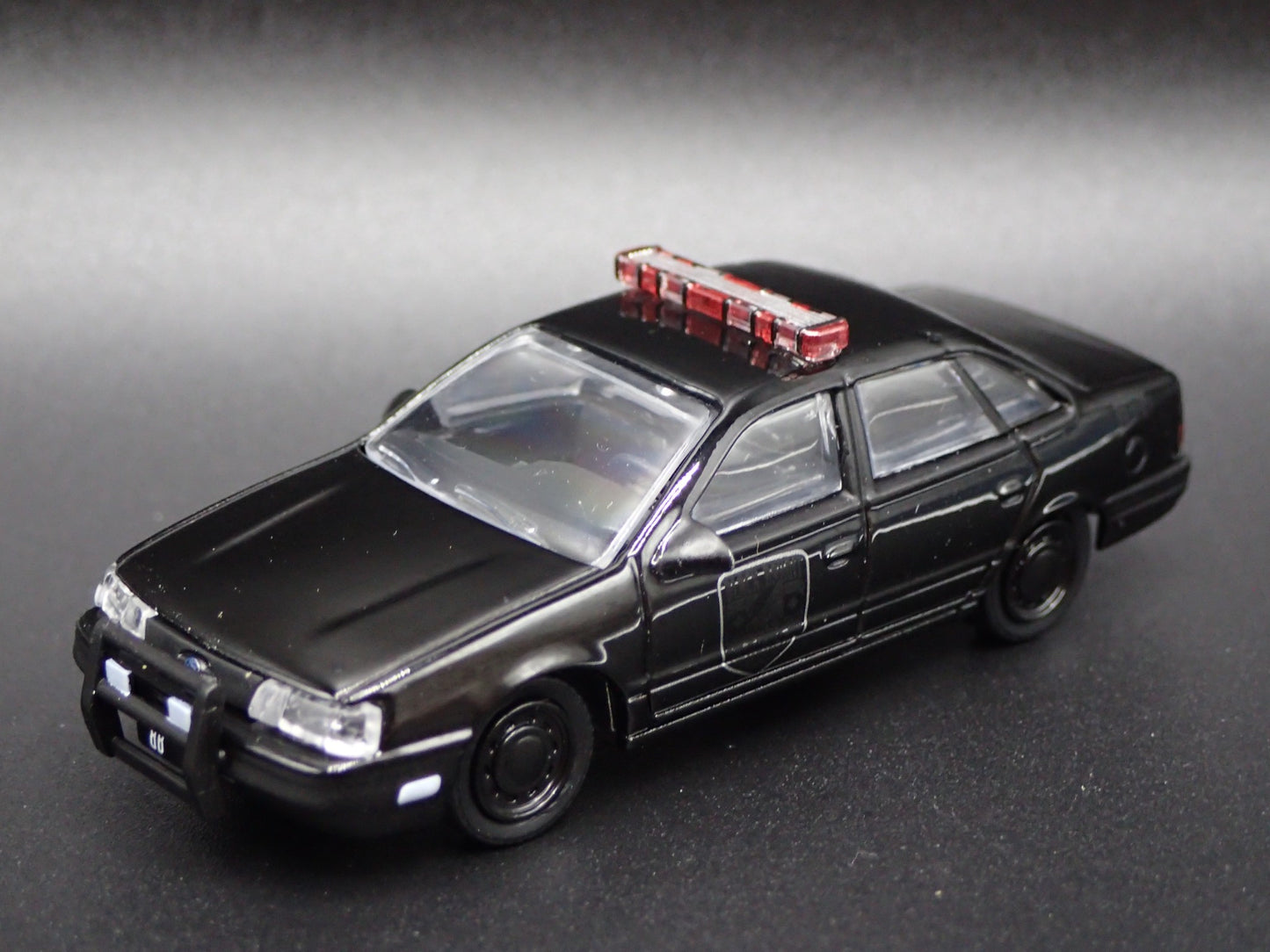 1986-1991 FORD TAURUS POLICE CAR 4 FOUR DOOR BLACK 1:64 SCALE DIECAST MODEL CAR