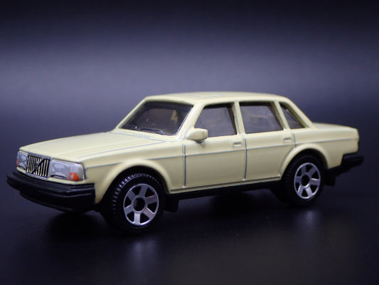 VOLVO 240 4 FOUR DOOR YELLOW 1:64 SCALE COLLECTIBLE DIORAMA DIECAST MODEL CAR