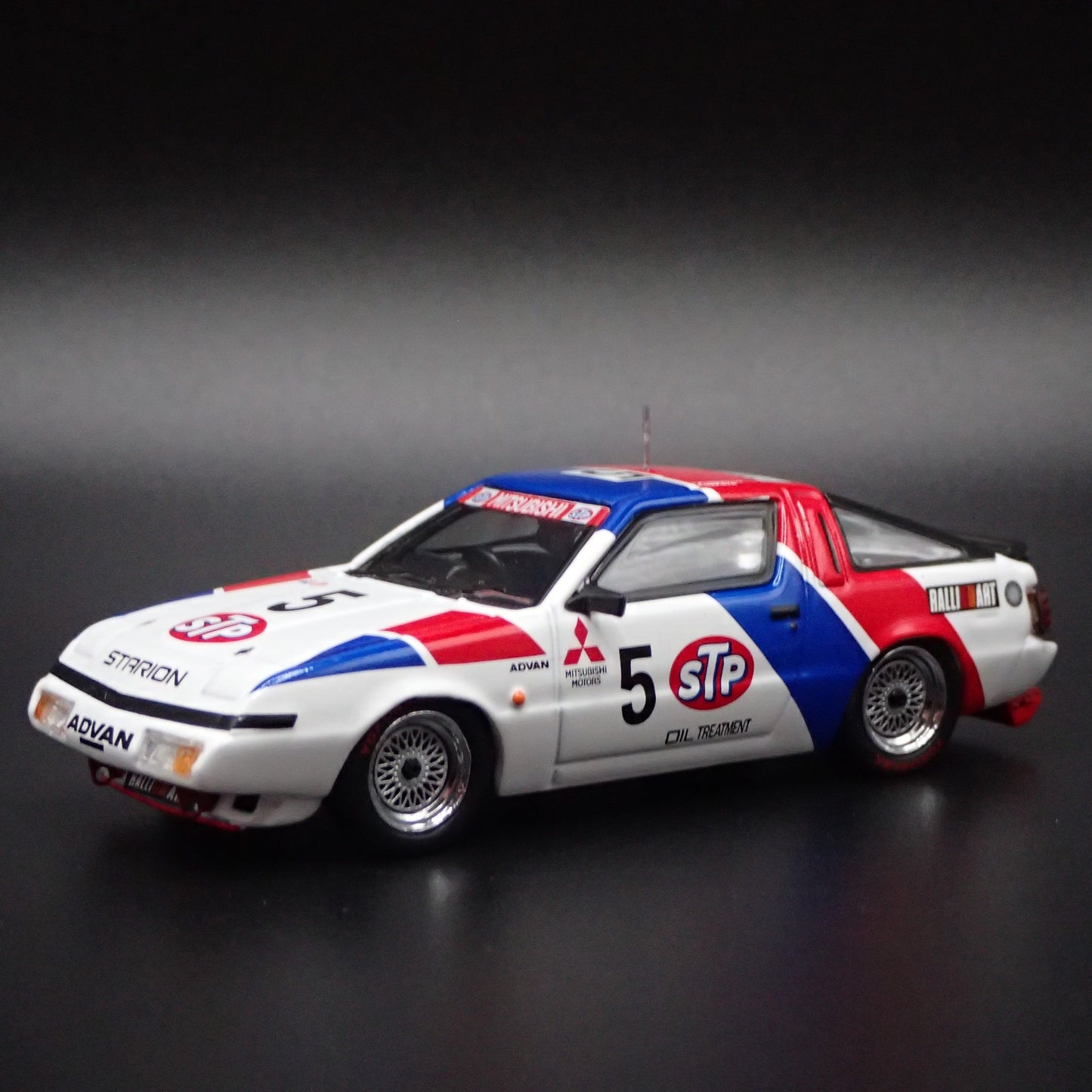 1983-1989 MITSUBISHI STARION STP ADVAN JDM 1:64 SCALE DIORAMA DIECAST MODEL CAR