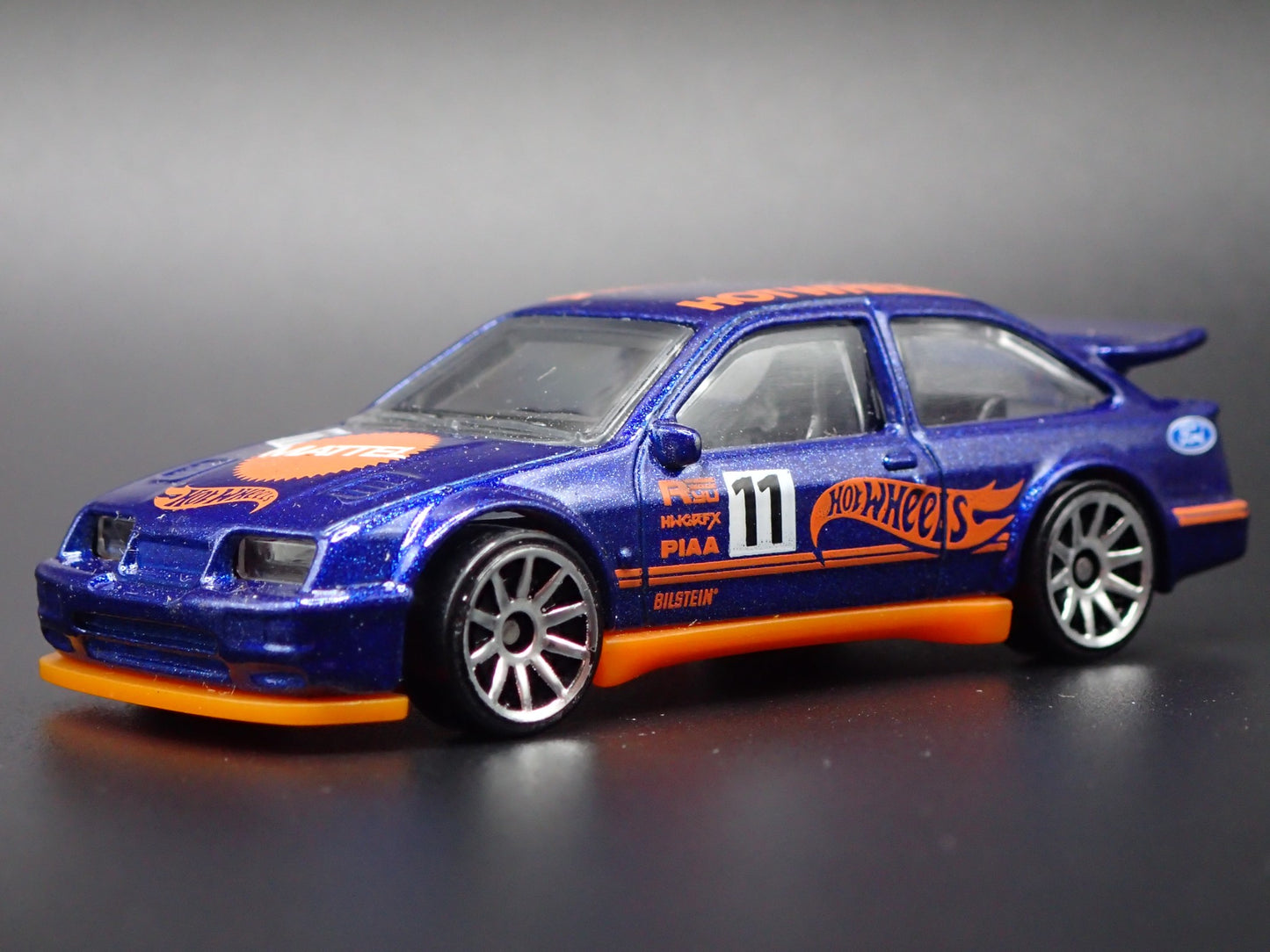 1986-1992 FORD ESCORT COSWORTH 1:64 SCALE COLLECTIBLE DIORAMA DIECAST MODEL CAR