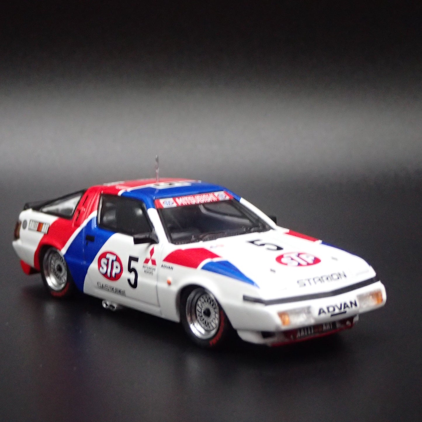 1983-1989 MITSUBISHI STARION STP ADVAN JDM 1:64 SCALE DIORAMA DIECAST MODEL CAR