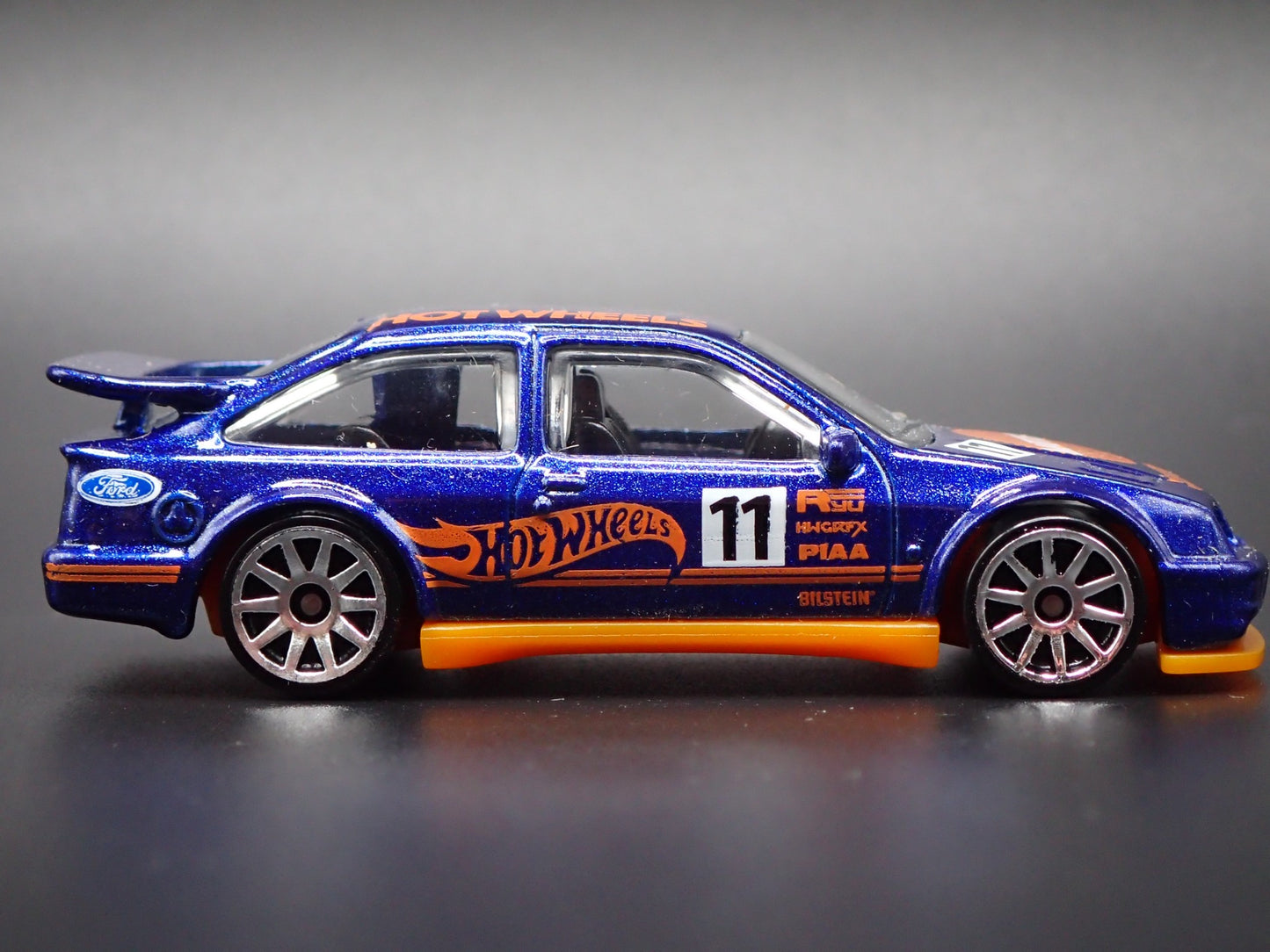 1986-1992 FORD ESCORT COSWORTH 1:64 SCALE COLLECTIBLE DIORAMA DIECAST MODEL CAR