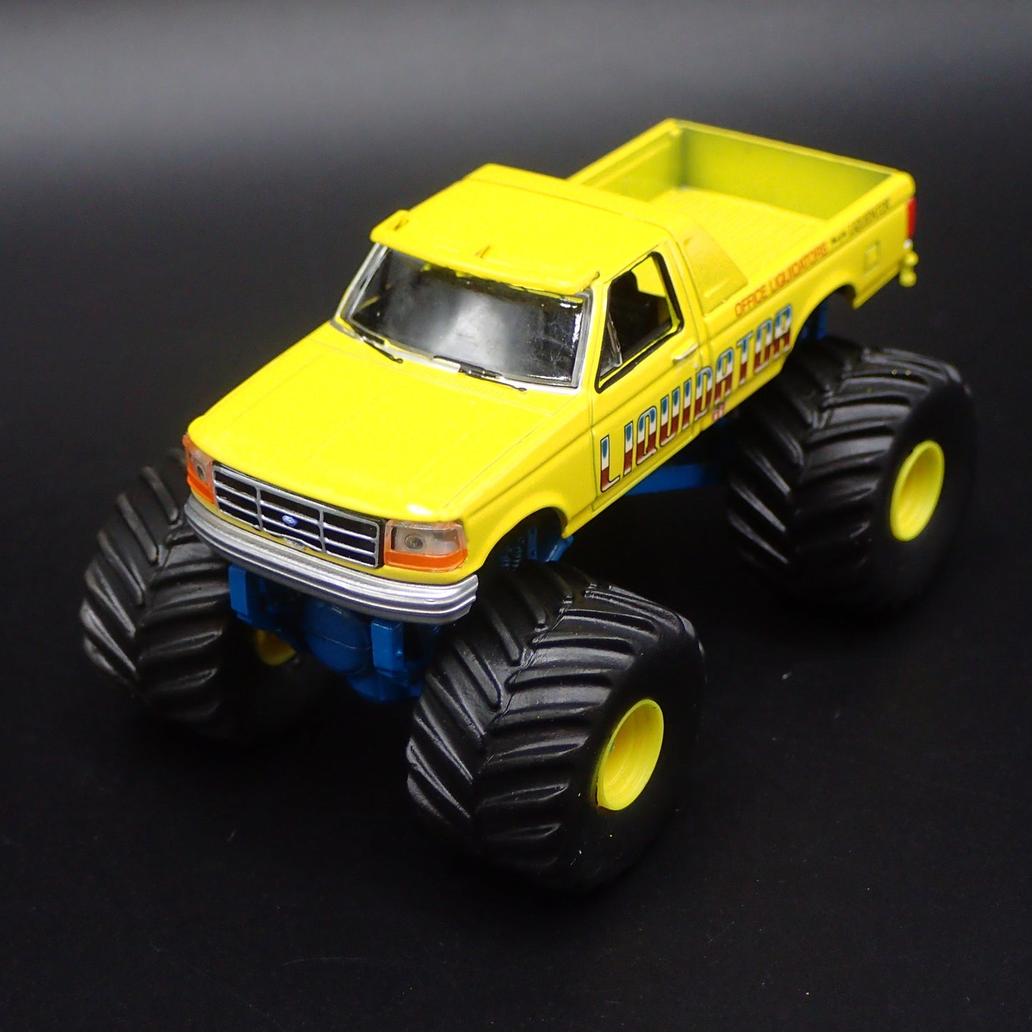 1992 92 FORD F250 MONSTER TRUCK LIQUIDATOR YELLOW 1/64 SCALE DIECAST MODEL CAR
