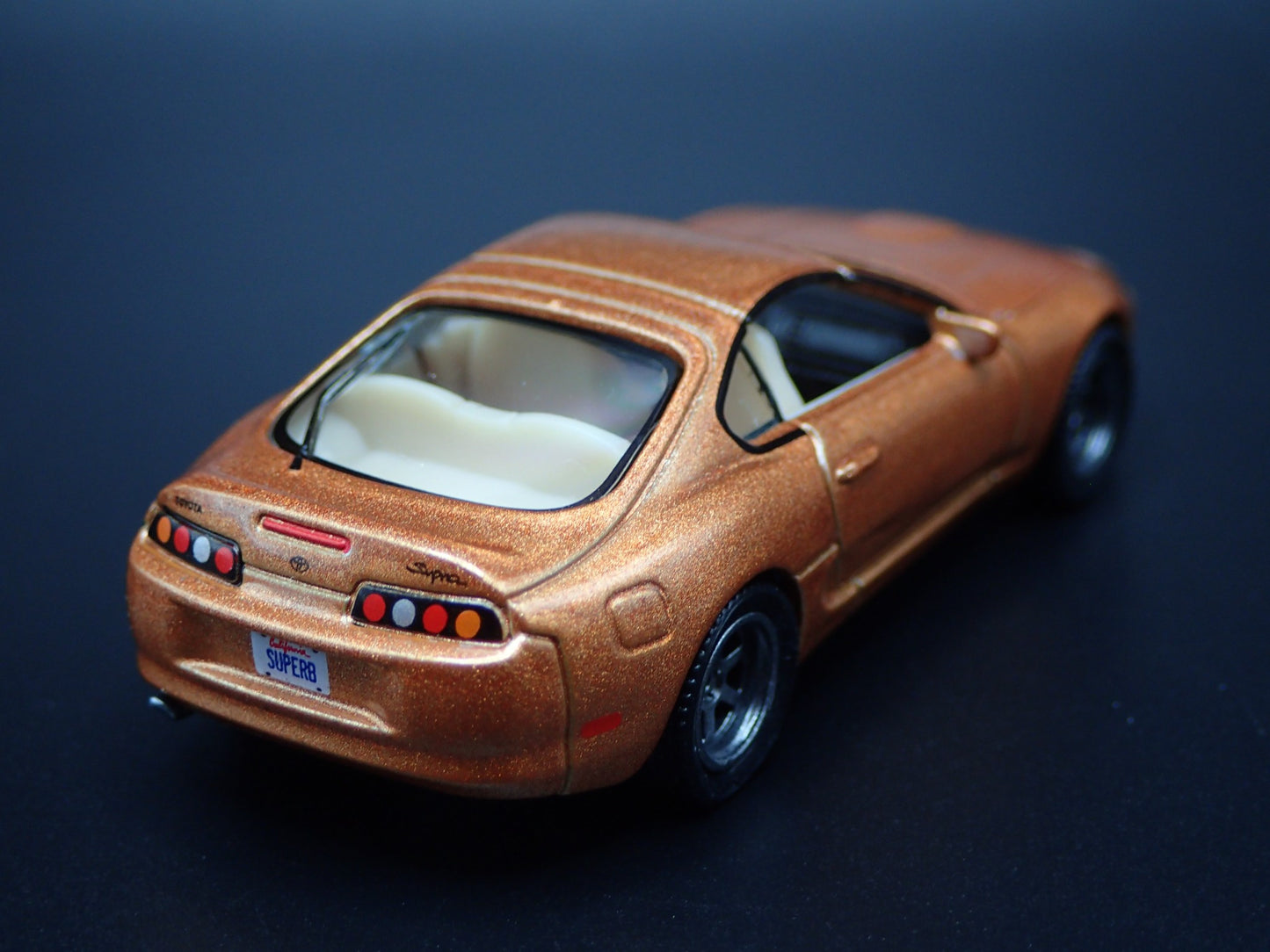 1993 - 2002 TOYOTA SUPRA GOLD 1/64 SCALE COLLECTIBLE DIORAMA DIECAST MODEL CAR