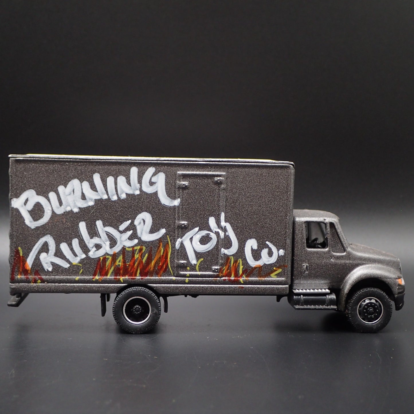 INTERNATIONAL DURASTAR BOX VAN TRUCK BURNING RUBBER 1/64 SCALE DIECAST MODEL CAR