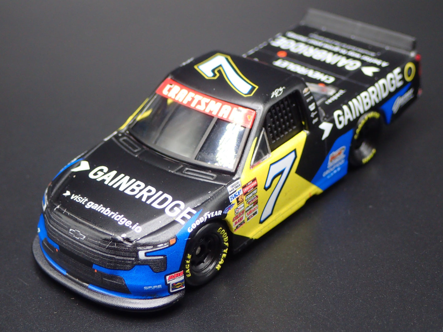2025 CHEVY SILVERADO 7 KYLE BUSCH GAINBRIDGE WIN NASCAR TRUCK 1:64 DIECAST CAR