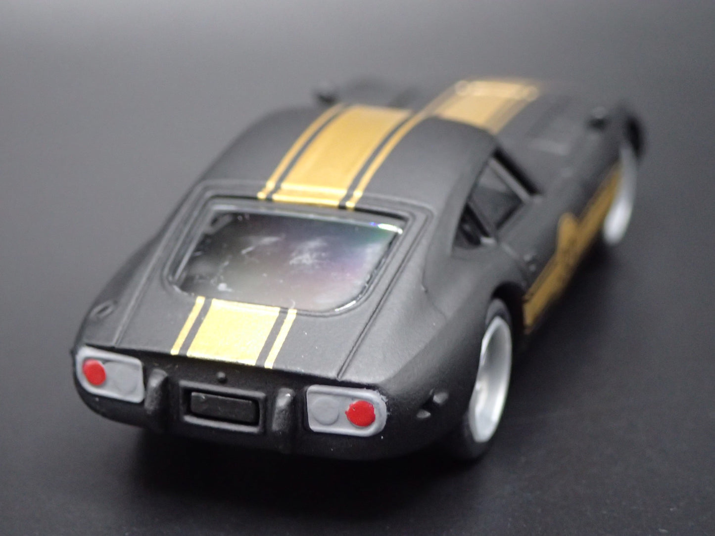 1967- 1970 TOYOTA 2000GT RACING BLACK 1:64 SCALE COLLECTIBLE DIECAST MODEL CAR