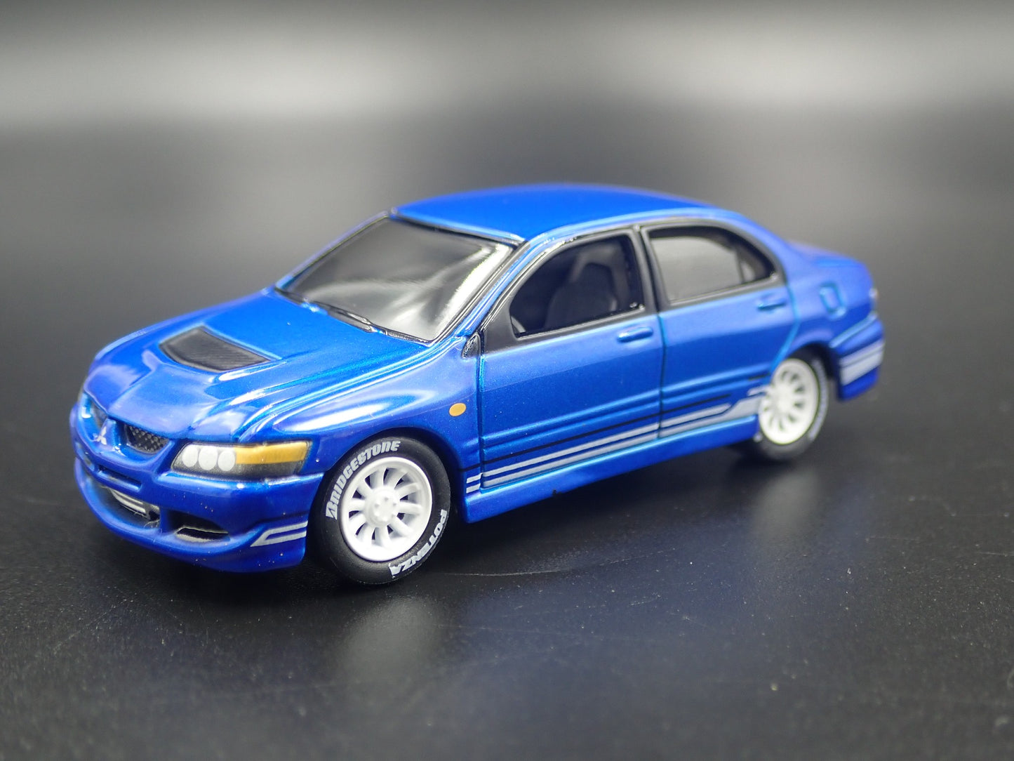 1999-2007 MITSUBISHI LANCER EVOLUTION EVO IV BLUE 1:64 SCALE DIECAST MODEL CAR