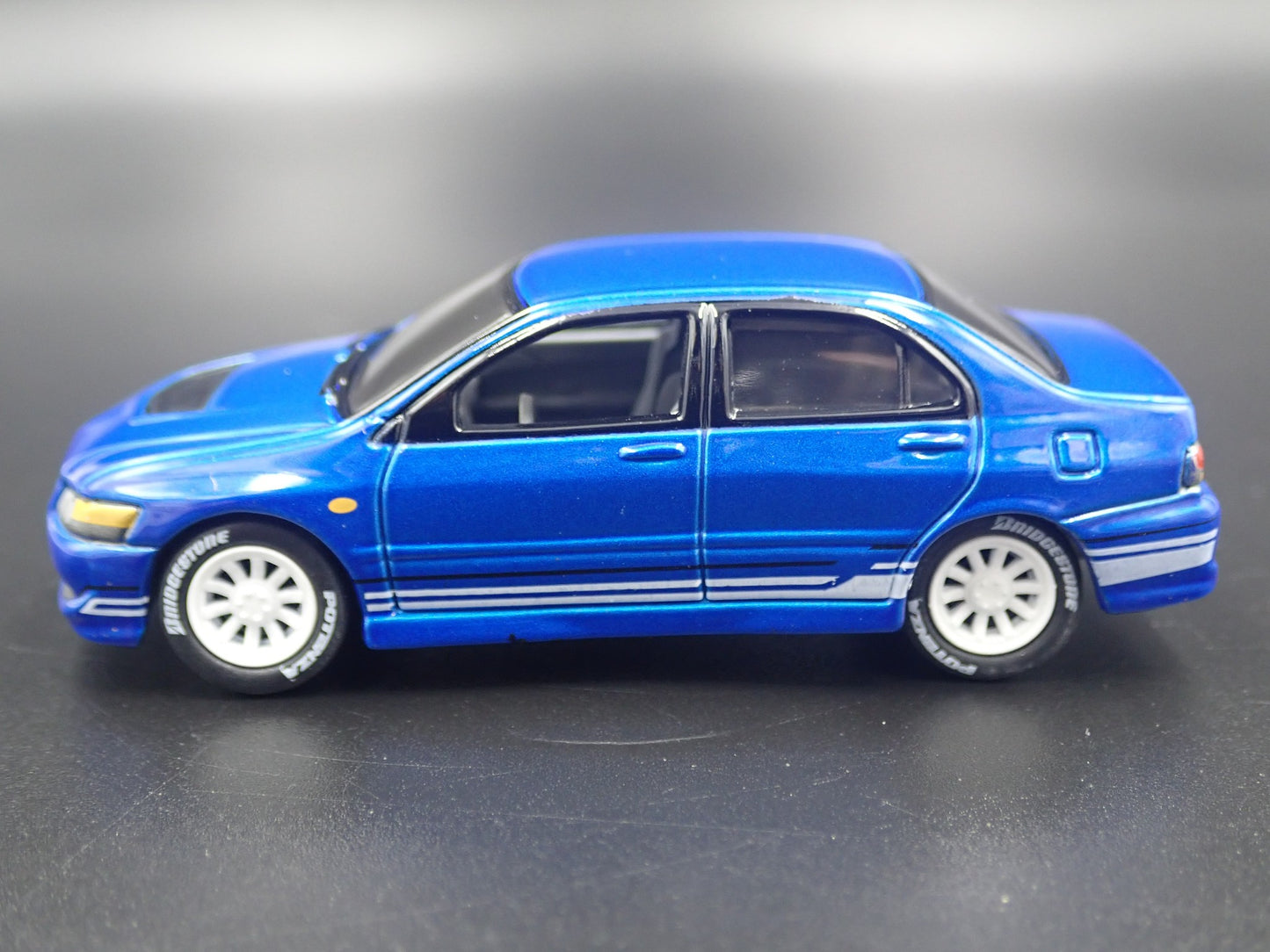 1999-2007 MITSUBISHI LANCER EVOLUTION EVO IV BLUE 1:64 SCALE DIECAST MODEL CAR