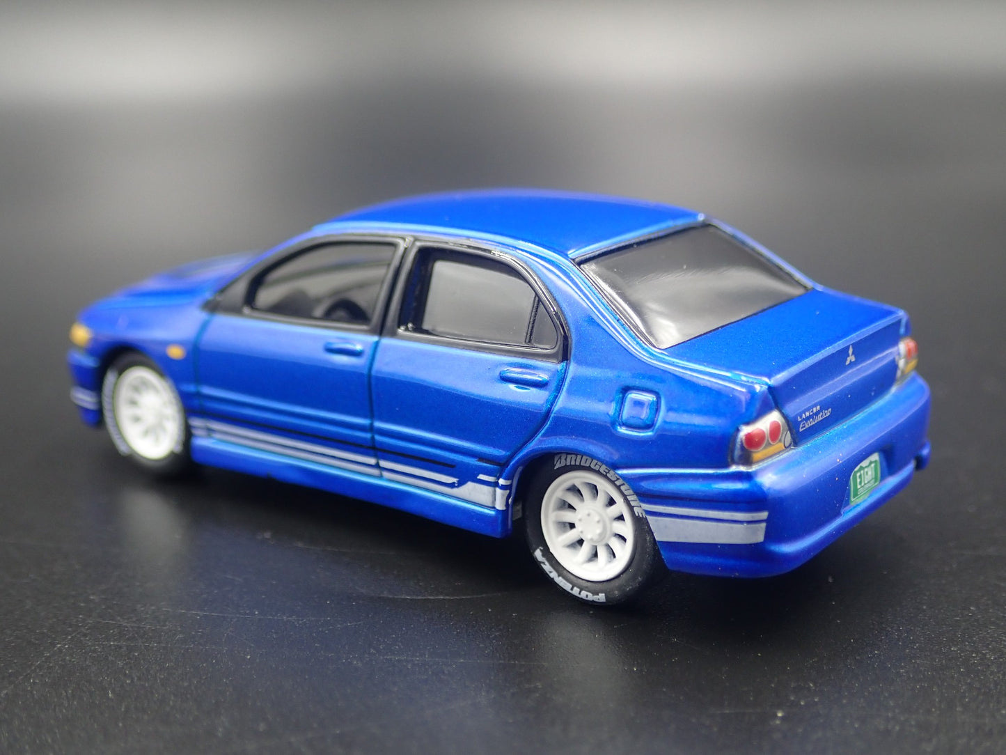 1999-2007 MITSUBISHI LANCER EVOLUTION EVO IV BLUE 1:64 SCALE DIECAST MODEL CAR