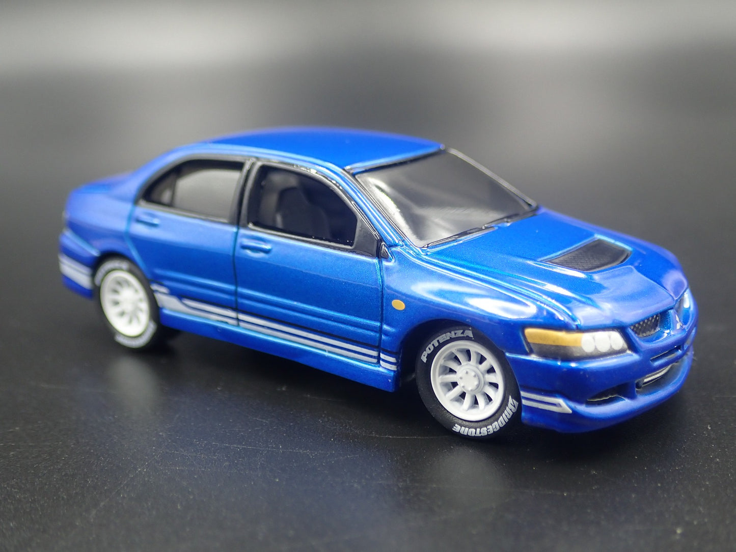 1999-2007 MITSUBISHI LANCER EVOLUTION EVO IV BLUE 1:64 SCALE DIECAST MODEL CAR