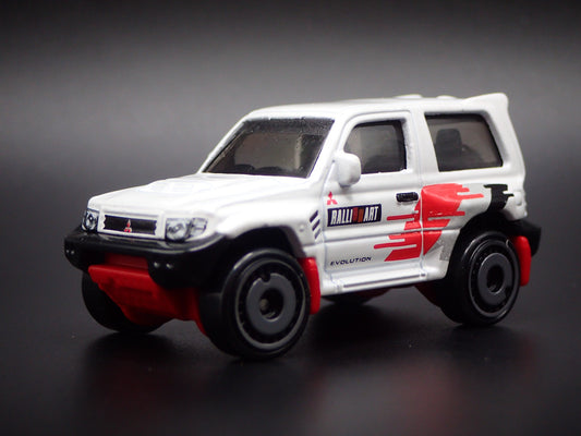 1997-1999 MITSUBISHI PAJERO EVOLUTION SUV 1:64 SCALE DIORAMA DIECAST MODEL CAR