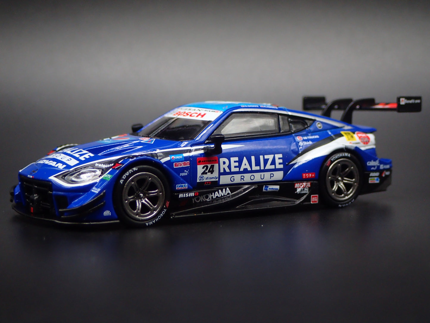 2023-2026 NISSAN Z GT500 #24 REALIZE KONDO RACING 1:64 SCALE DIECAST MODEL CAR