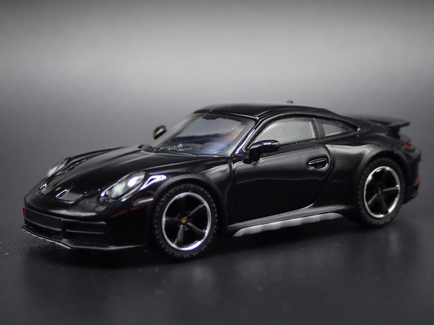 PORSCHE 911 DAKAR RALLYE OFF ROAD BLACK 1/64 SCALE COLLECTIBLE DIECAST MODEL CAR