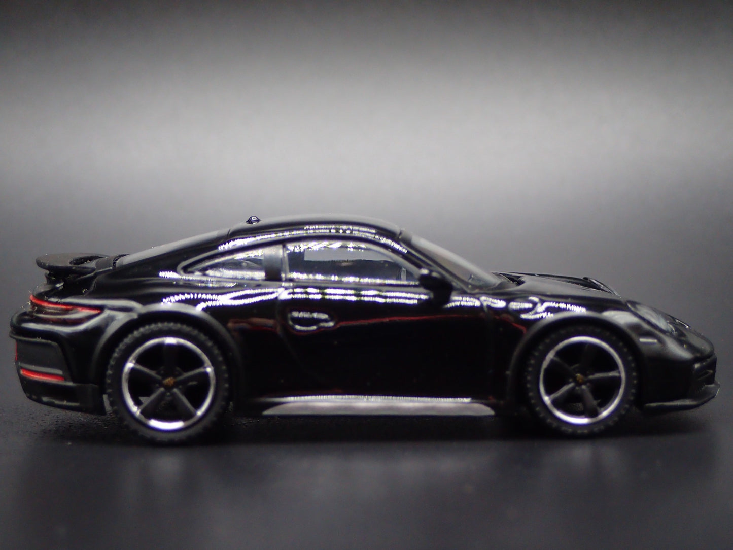 PORSCHE 911 DAKAR RALLYE OFF ROAD BLACK 1/64 SCALE COLLECTIBLE DIECAST MODEL CAR